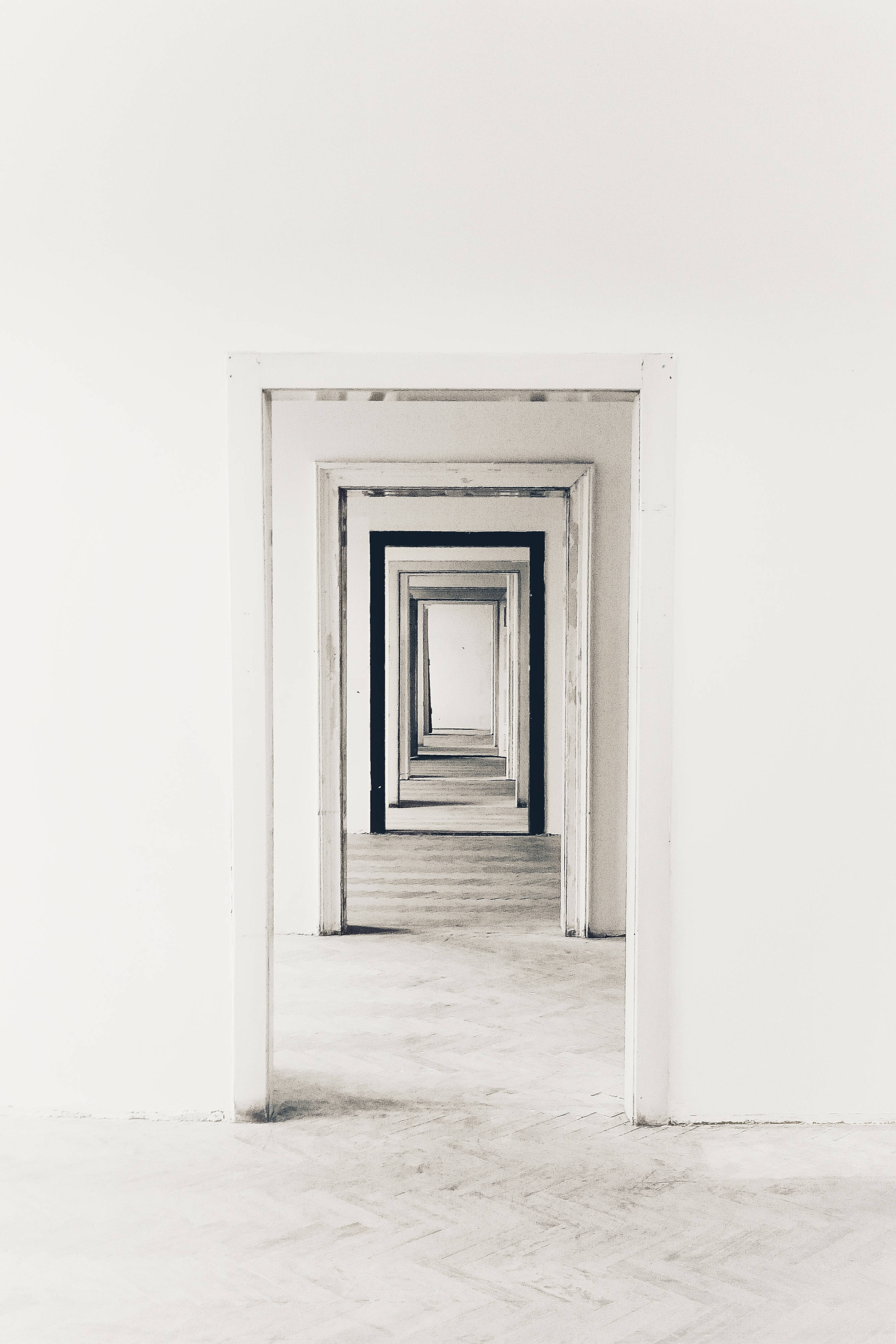 white aesthetic hallway, monochrome hallway, repeating doorways, 4K Phone Wallpaper