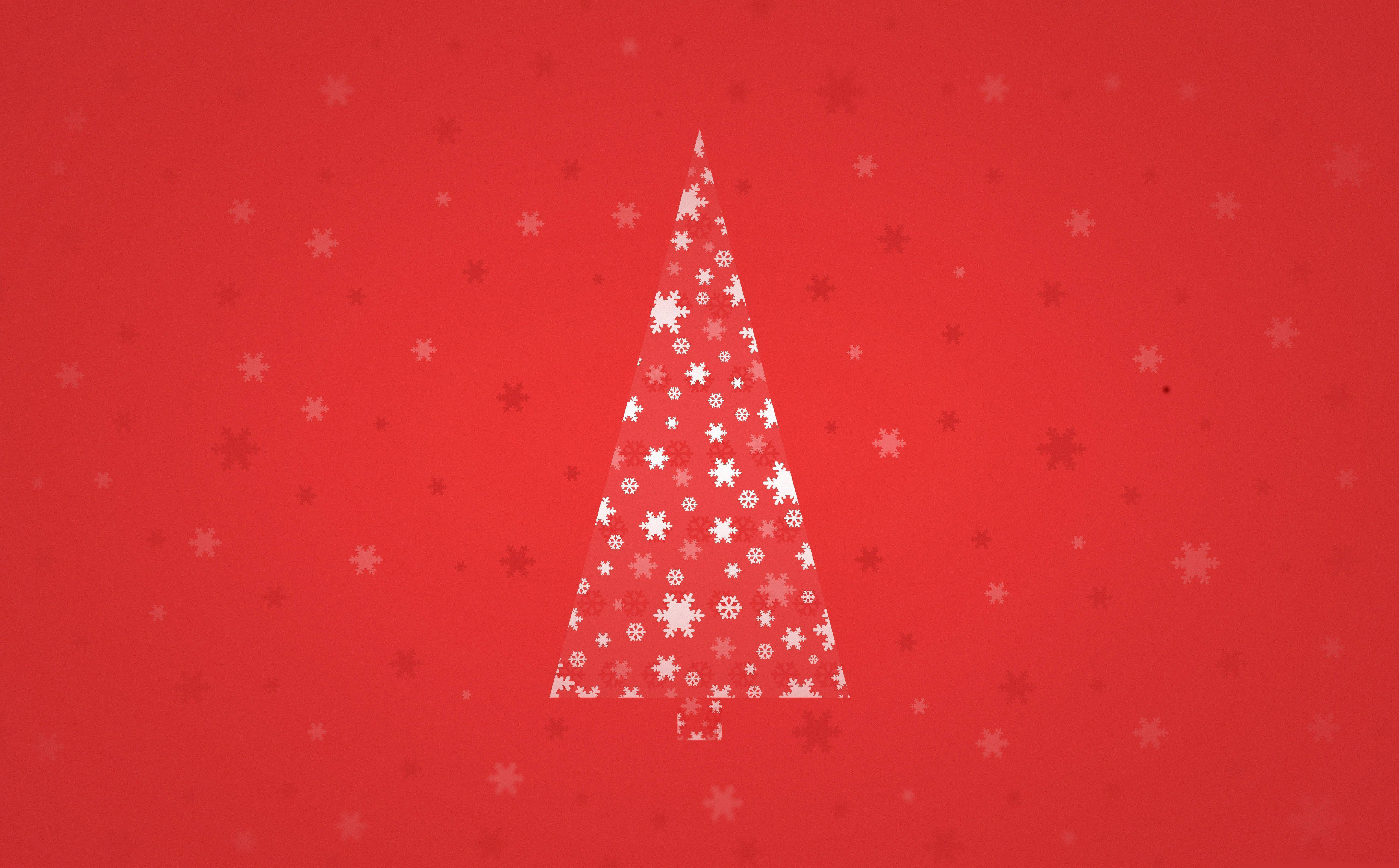 white snowflake-patterned Christmas tree, vibrant red background, scattered snowflakes, 5K Desktop Wallpaper