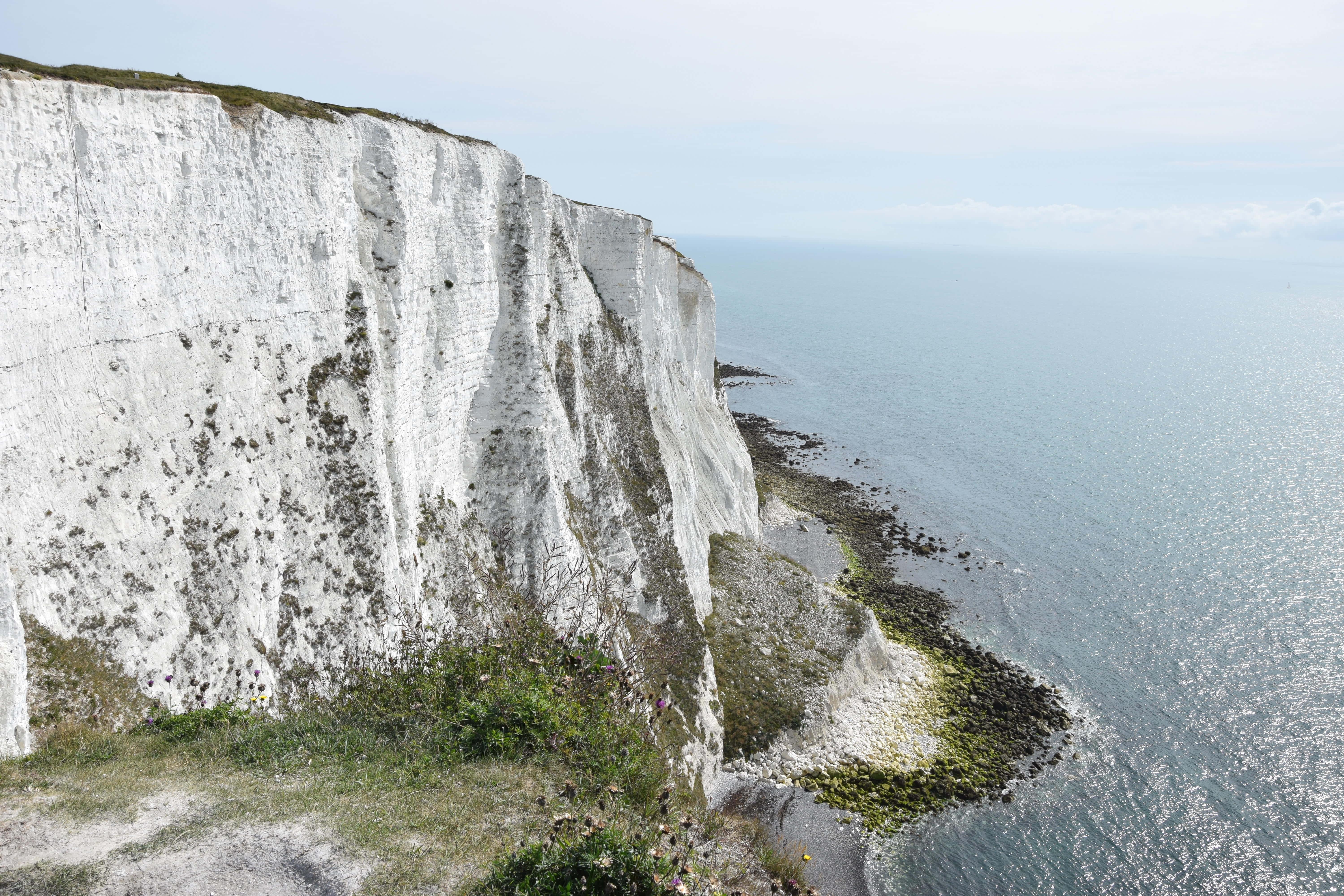 White Cliffs of Dover, chalk cliff face, calm blue sea, 5K Desktop Wallpaper