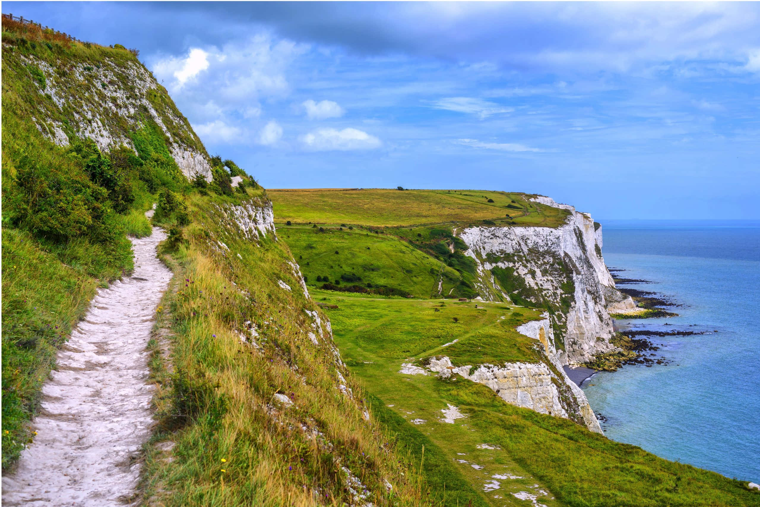White Cliffs of Dover, winding coastal path, lush green cliffs, 2K Desktop Wallpaper