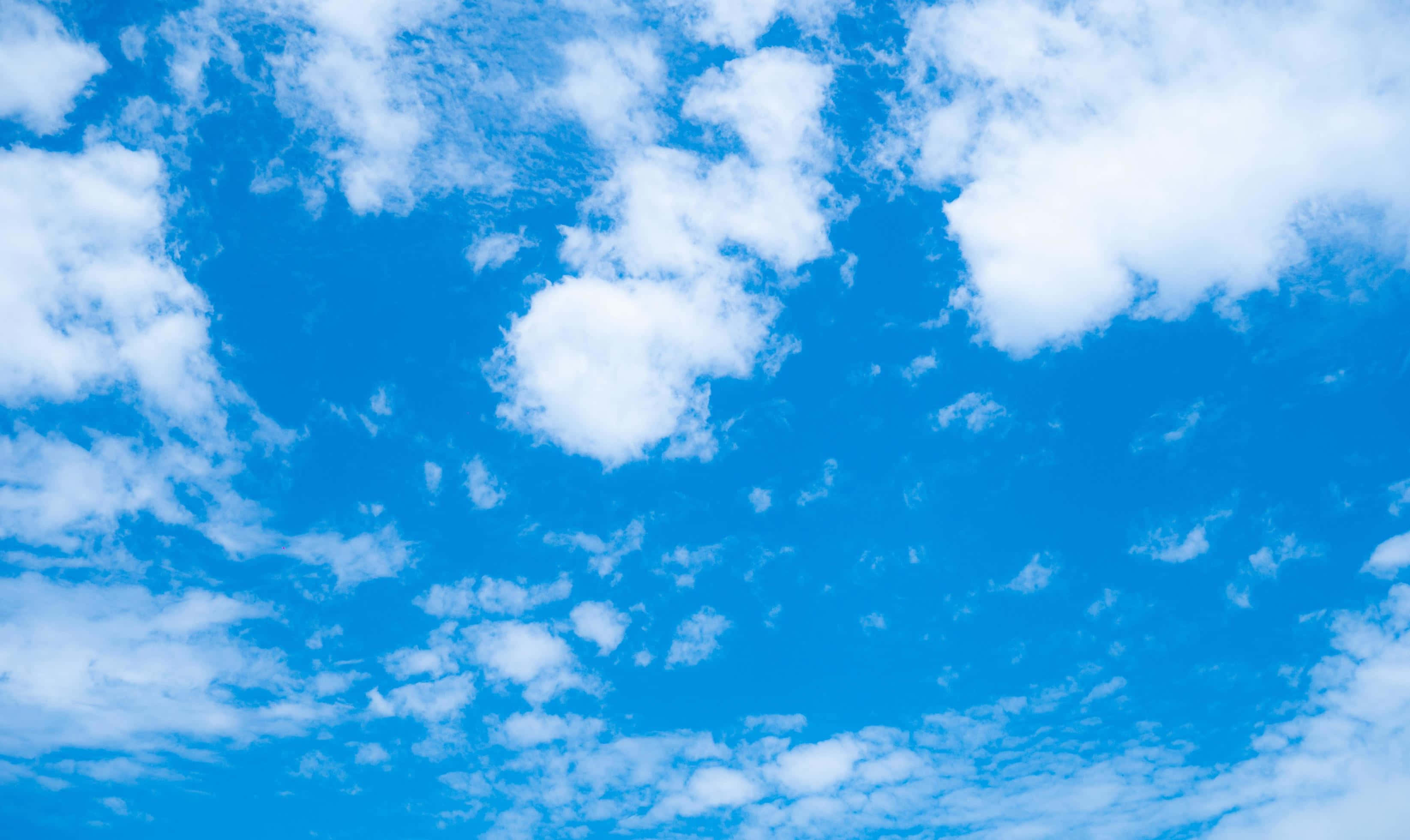 White Clouds, vibrant blue sky, fluffy white clouds, 2K Desktop Wallpaper