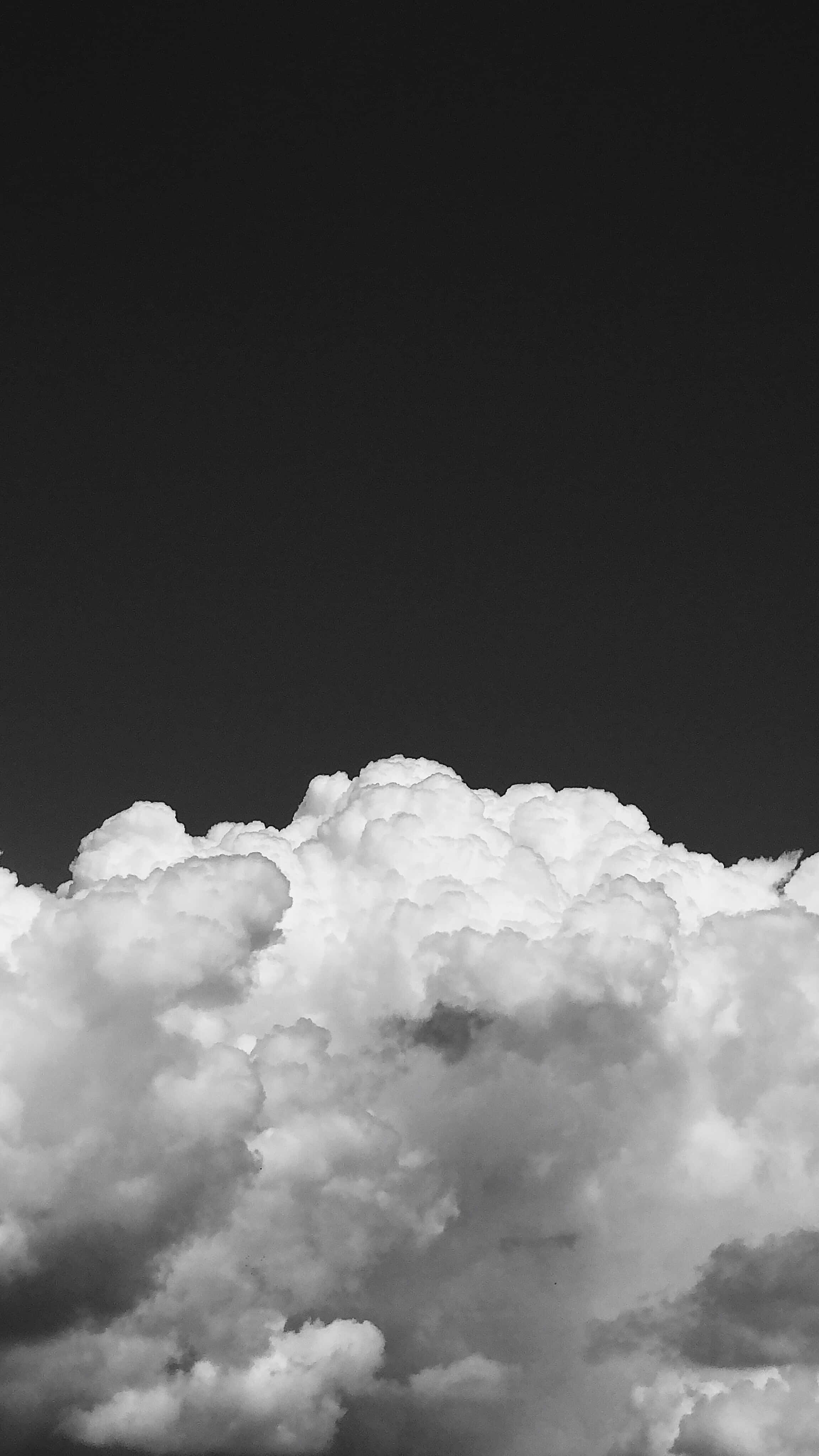 White Clouds, black sky, high-contrast black and white photograph, 4K Phone Wallpaper