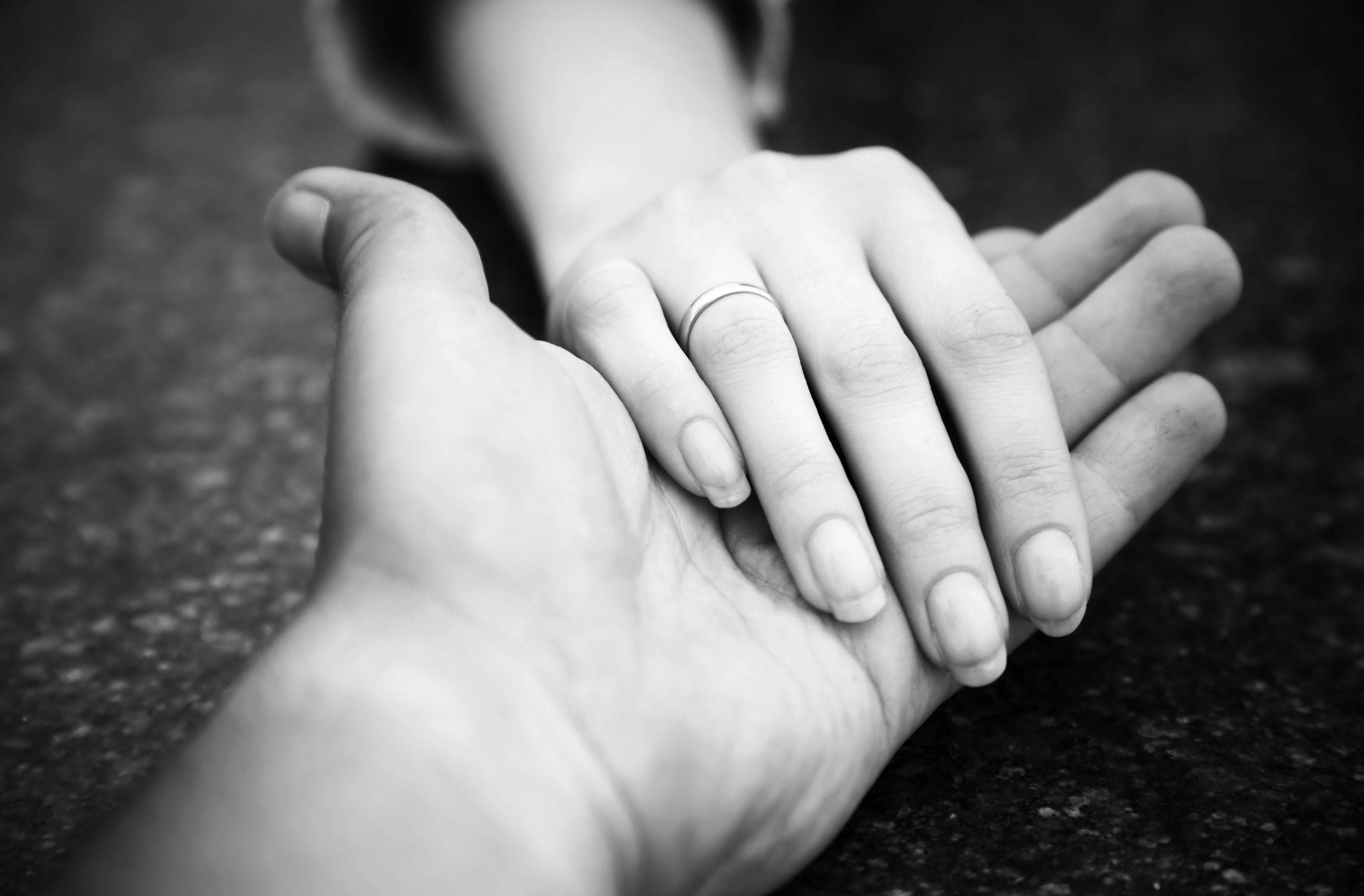 minimalist white background, black and white, two hands clasped together, 2K Desktop Wallpaper