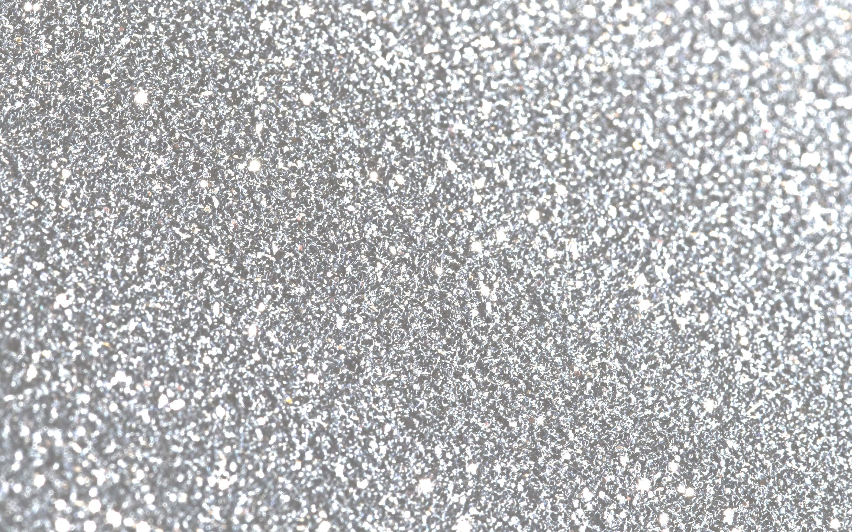 white glitter, shimmering silver glitter particles, textured surface, 2K Desktop Wallpaper