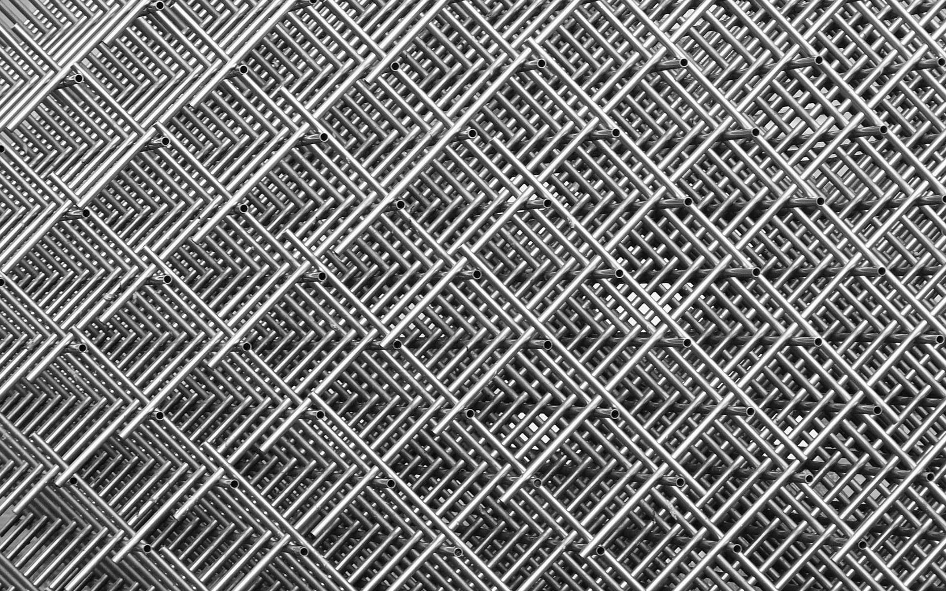 metallic chain-link fence, repeating diamond patterns, industrial sheen, Full HD Desktop Wallpaper