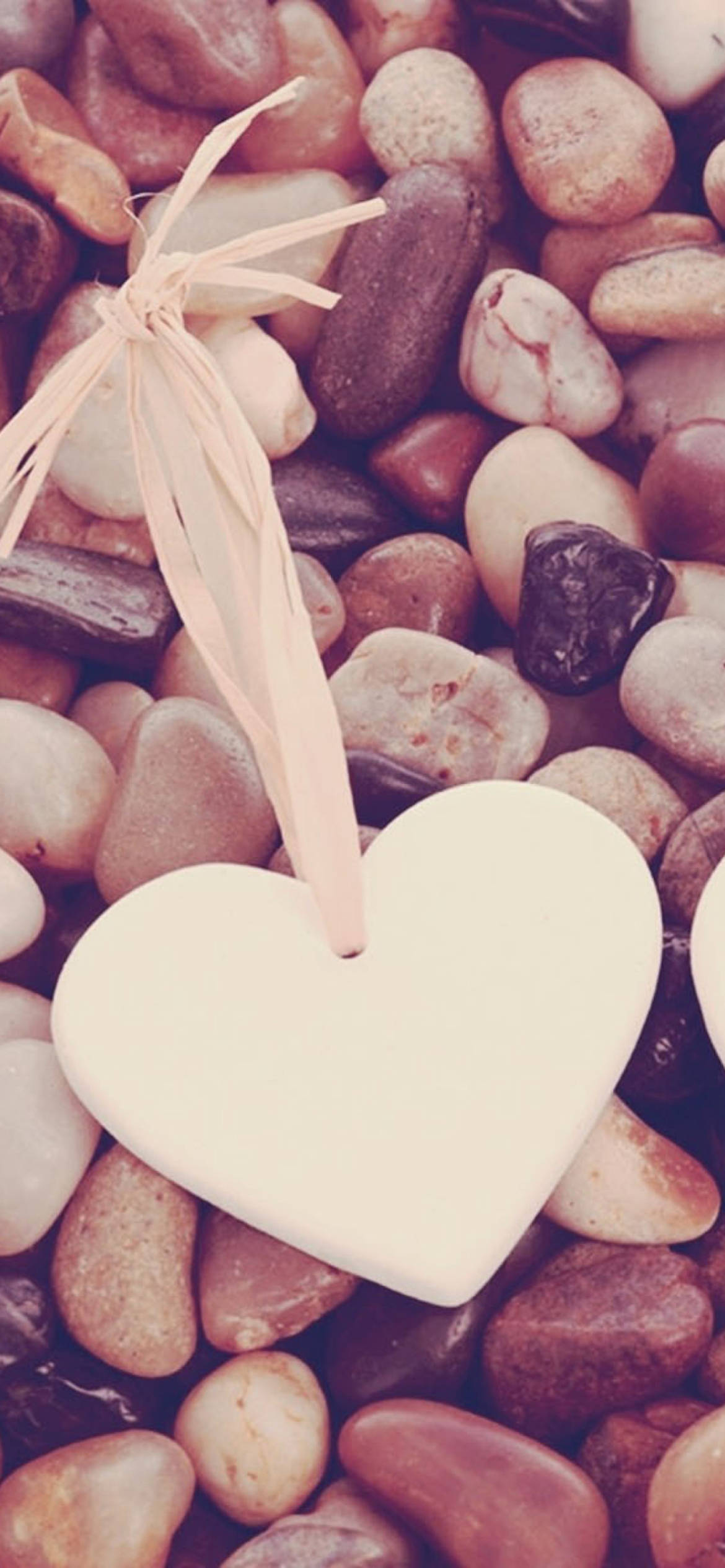 white ceramic heart ornament, beige ribbon, smooth multicolored river rocks, Full HD Phone Wallpaper