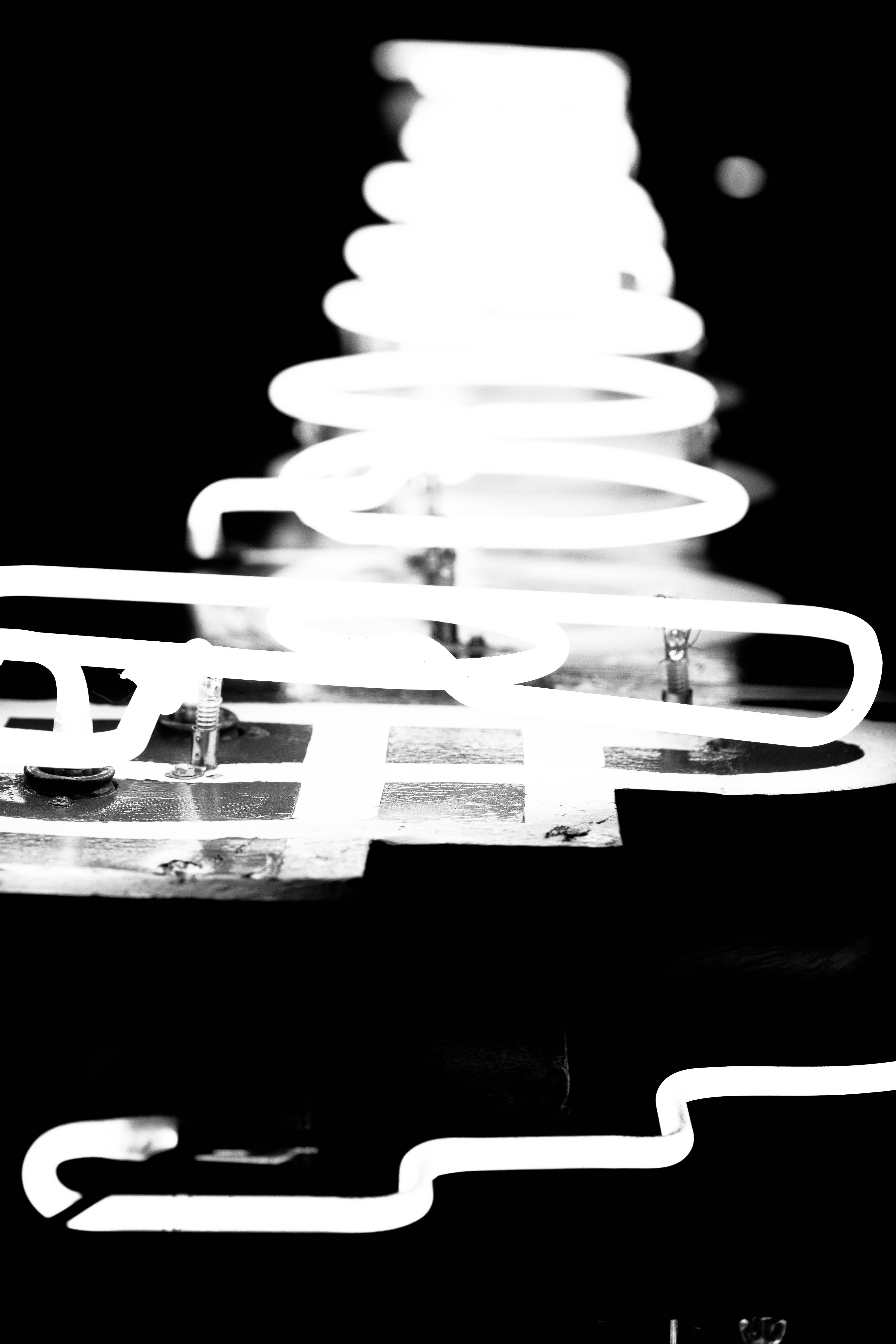 white neon sign, spiral tree, stark black and white, 5K Phone Wallpaper