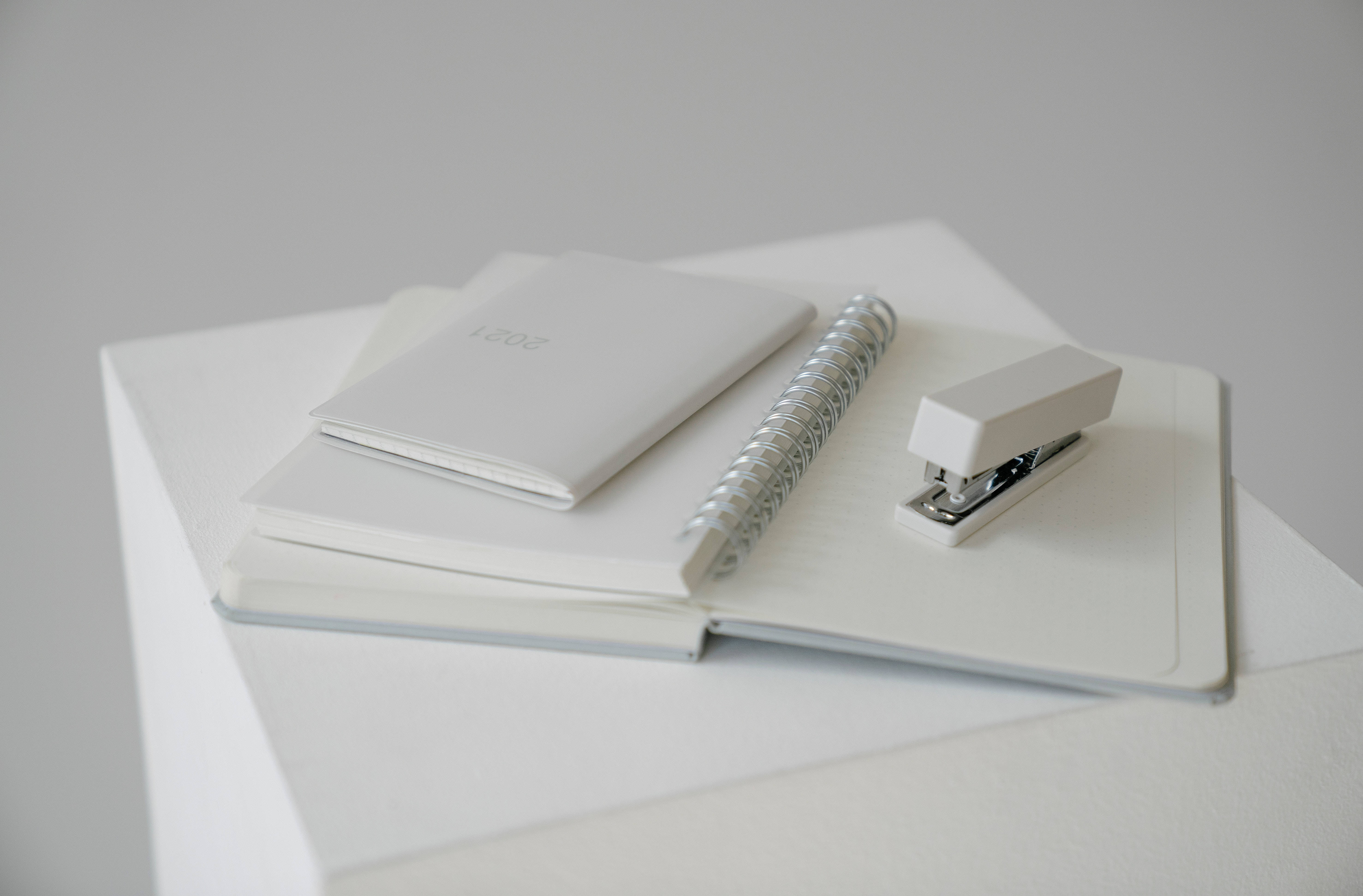 Pure White Stationery, notebooks, stapler, 5K Desktop Wallpaper