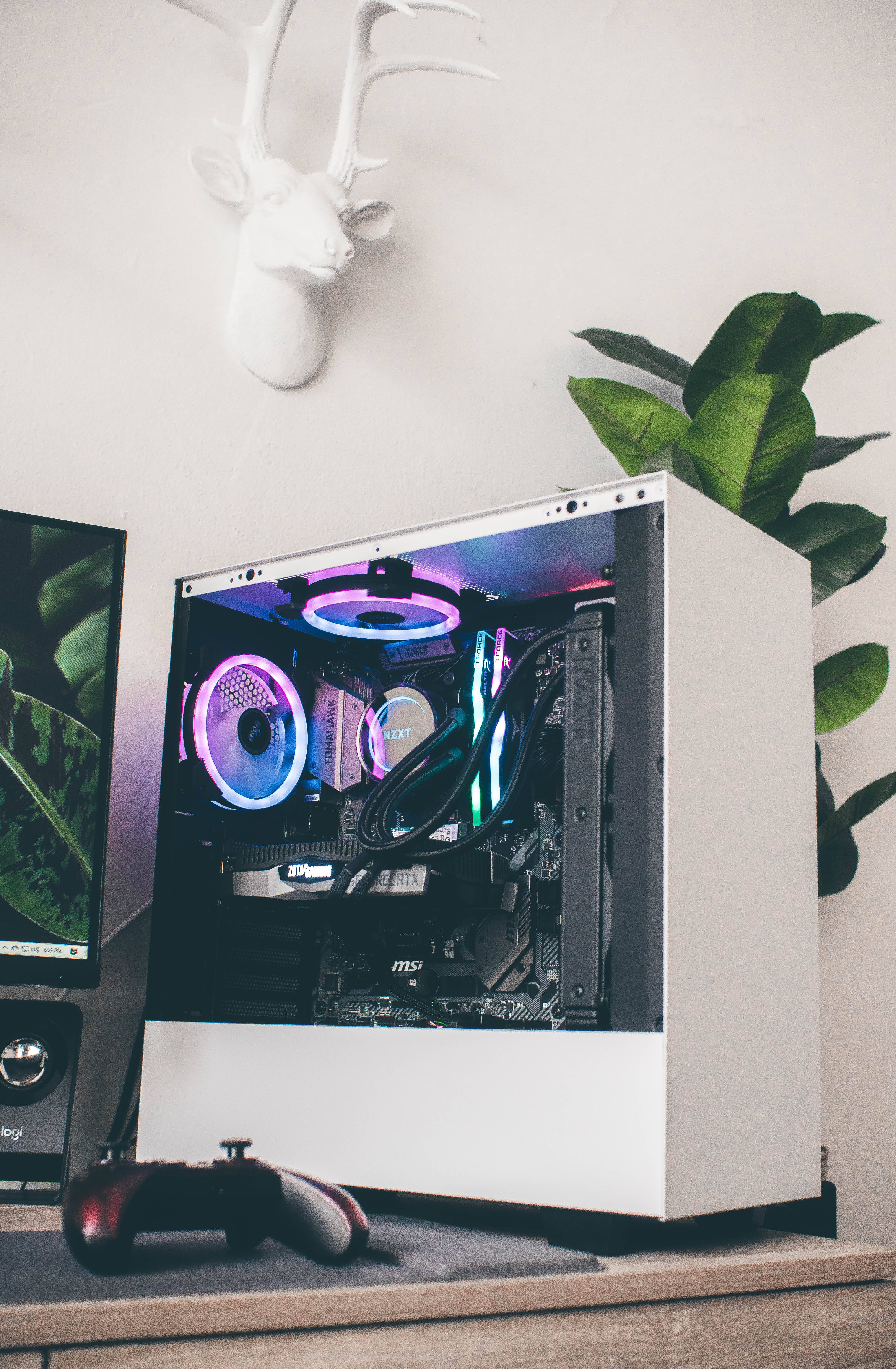 white PC, glowing purple and blue internals, desk, 5K Phone Wallpaper