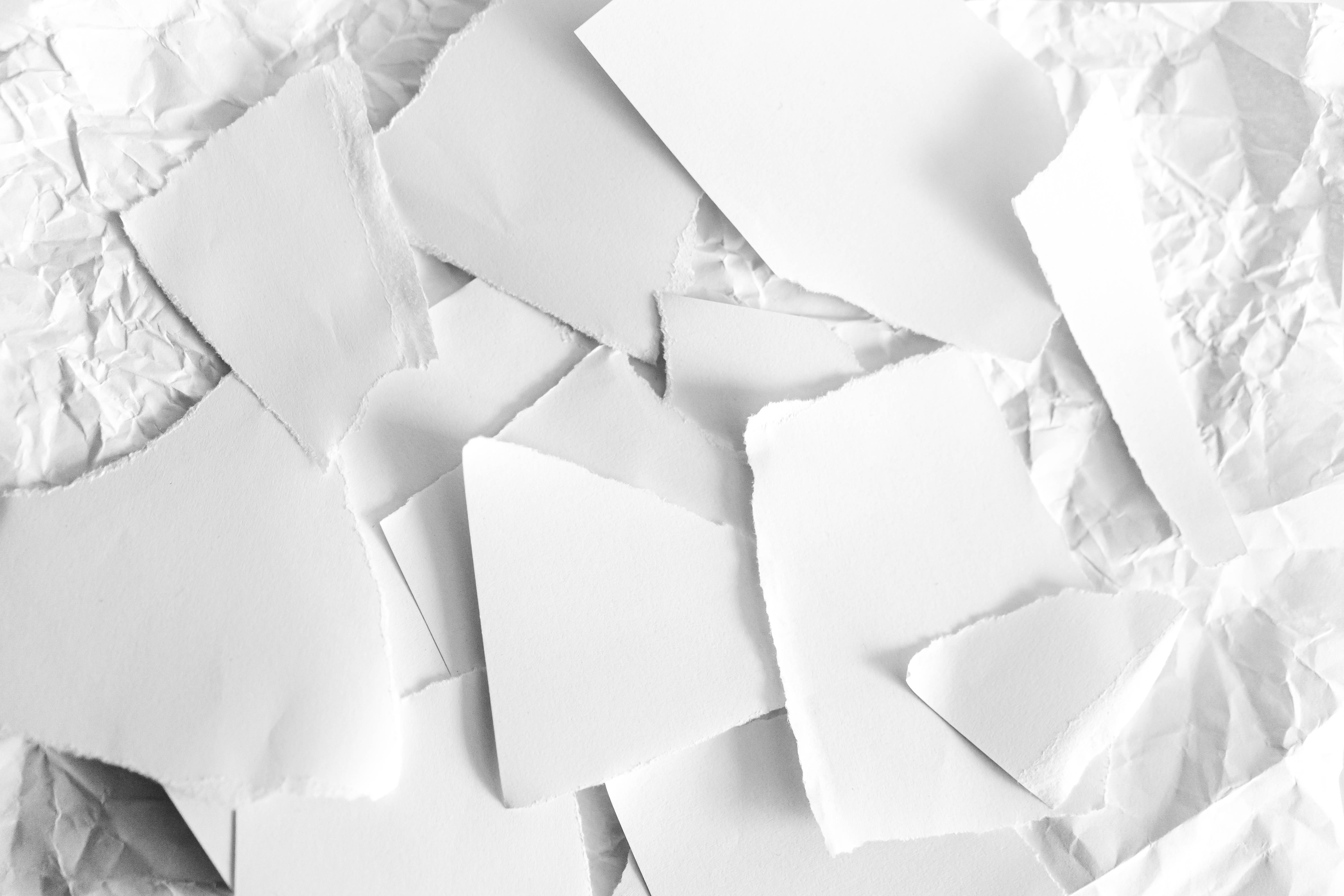 torn white paper pieces, crumpled white paper surface, close-up, 5K Desktop Wallpaper