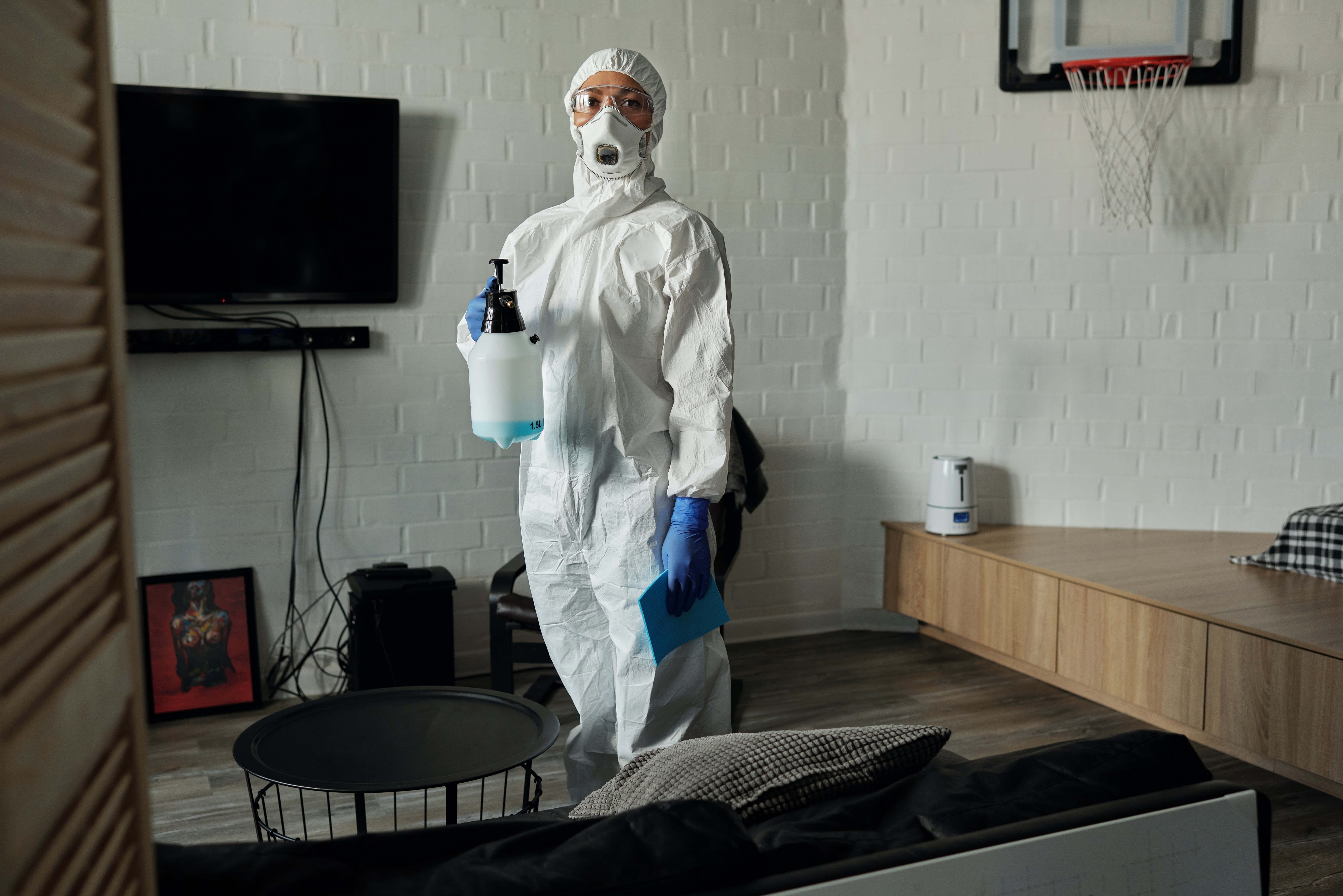 white hazmat gear, spray bottle, modern living room, 5K Desktop Wallpaper
