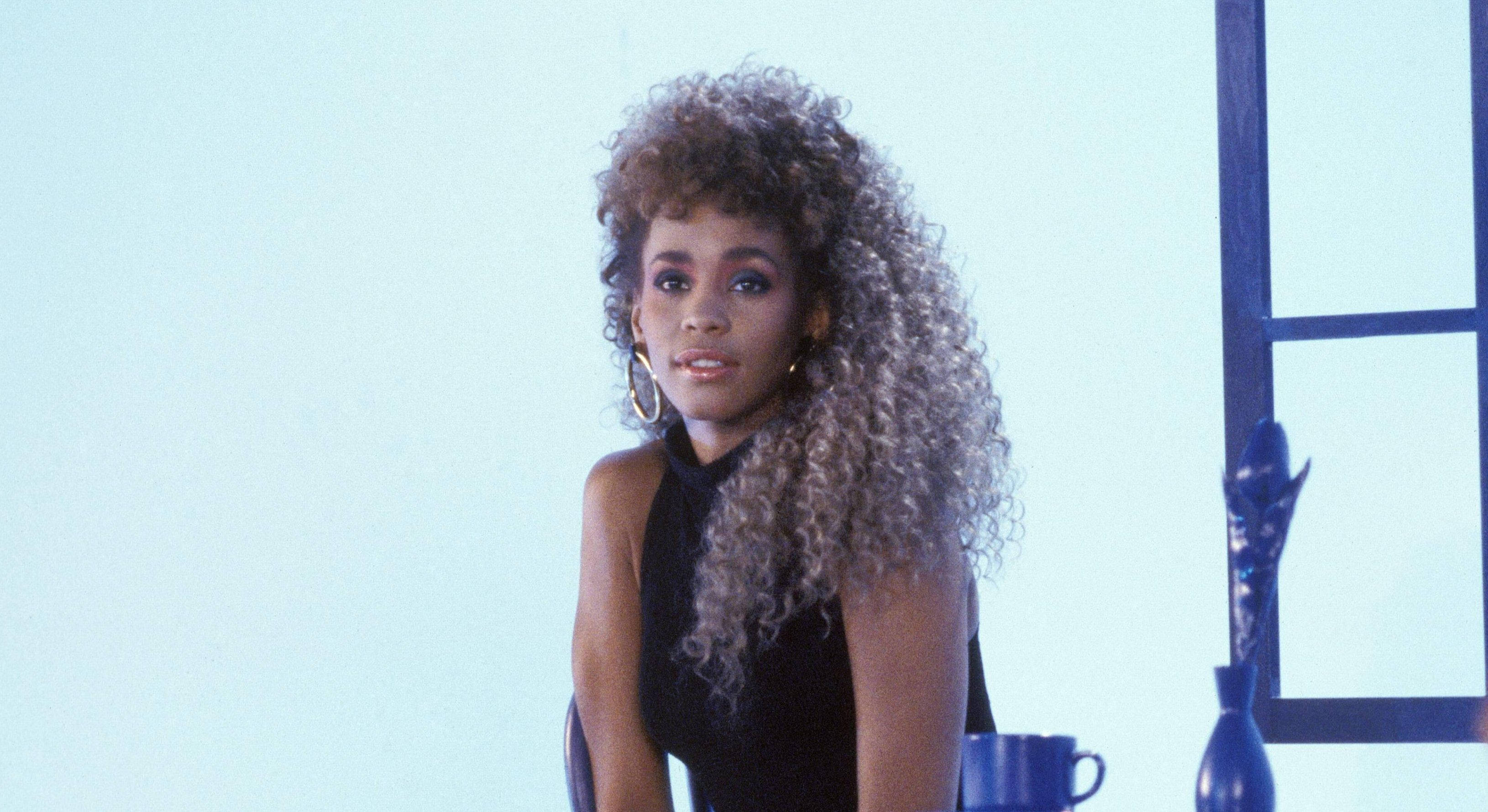 Whitney Houston, voluminous curly hair, hoop earrings, 2K Desktop Wallpaper