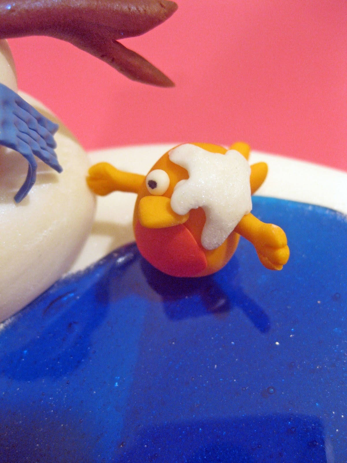 orange clay bird, white foam on its head, blue glittery surface, HD Phone Wallpaper