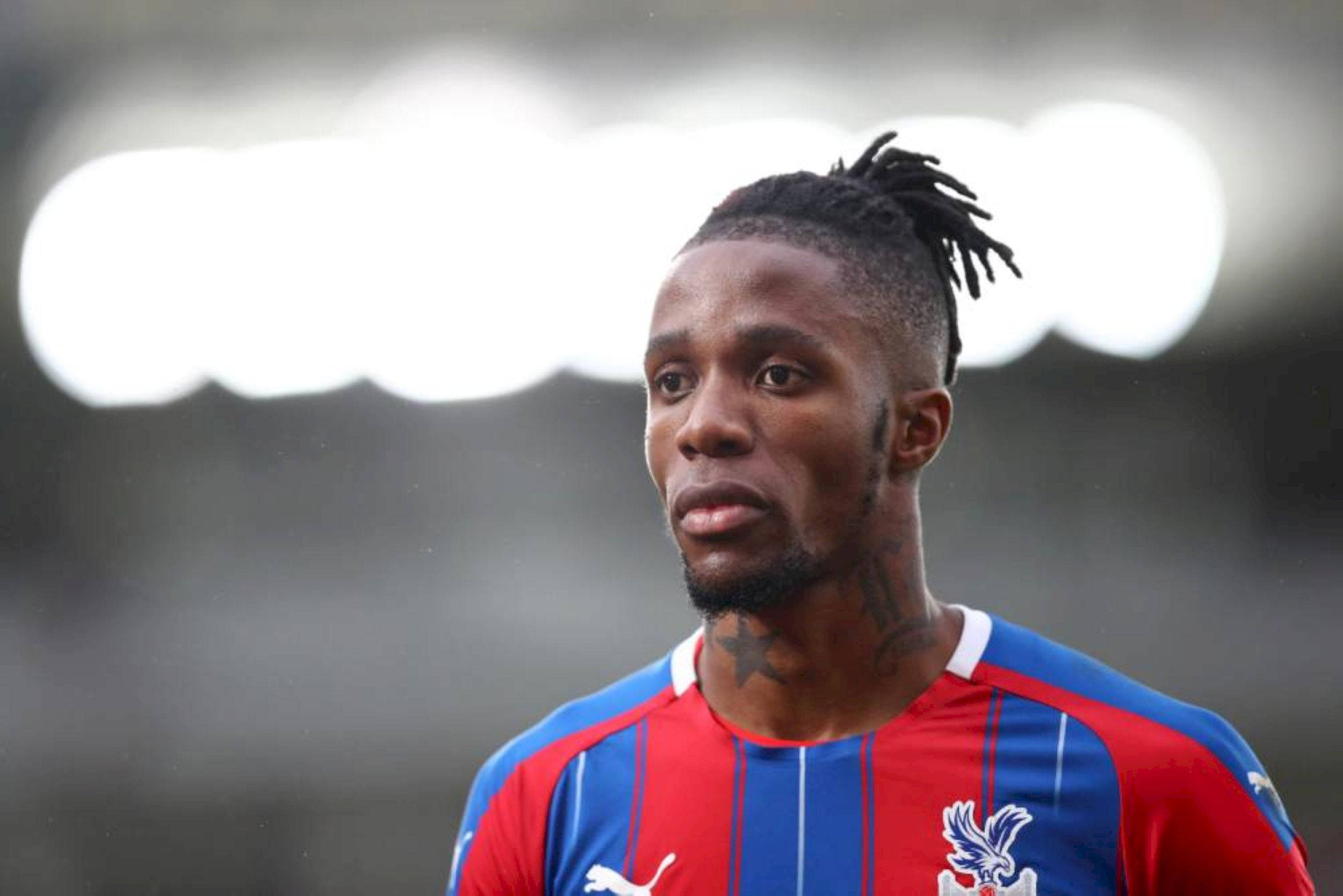 Wilfried Zaha, red and blue striped jersey, stadium backdrop, Full HD Desktop Wallpaper