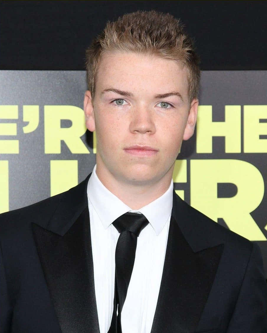 Will Poulter, black suit, yellow text, SD Phone Wallpaper