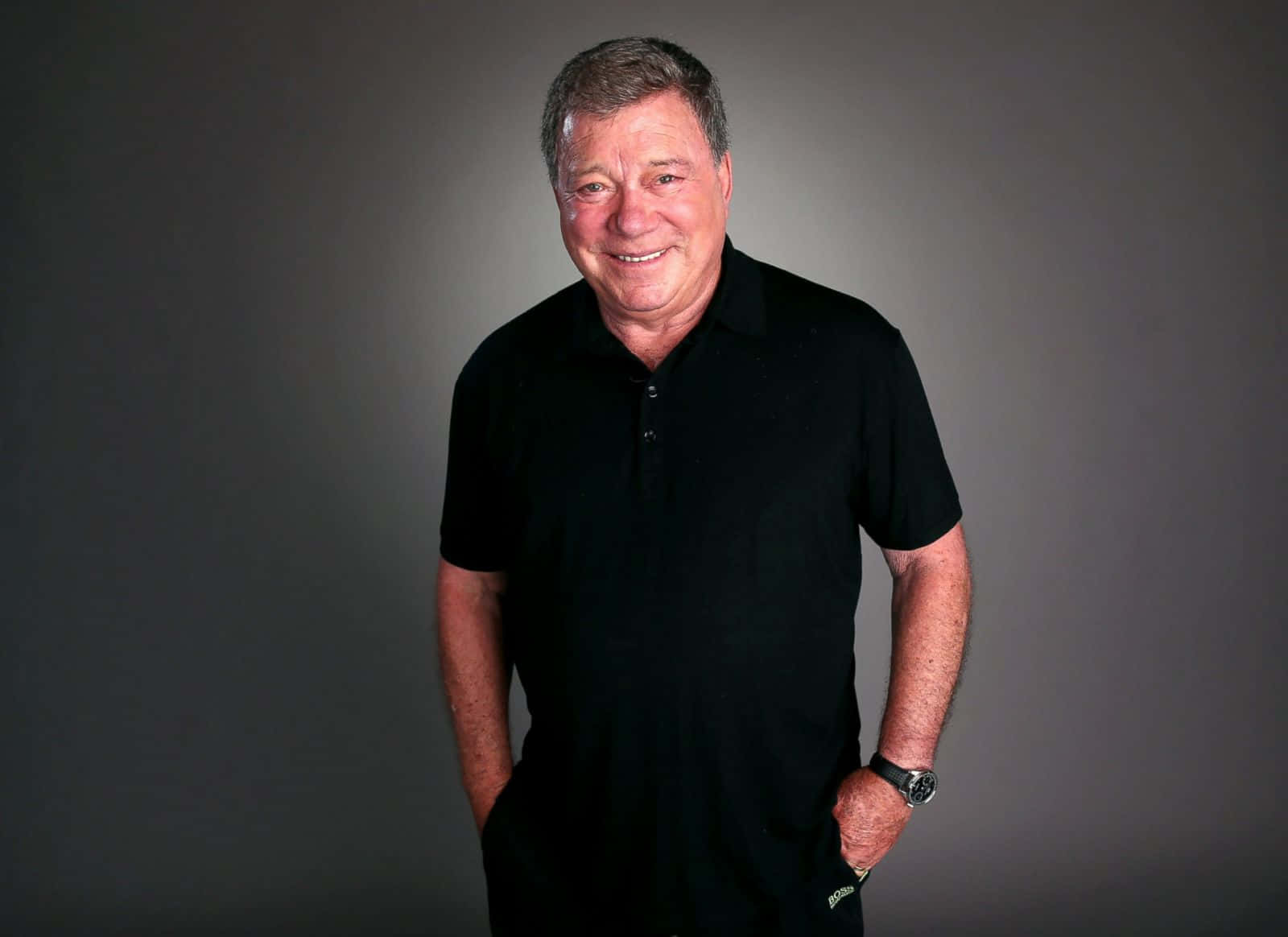 William Shatner, black polo shirt, plain gray studio backdrop, HD Desktop Wallpaper