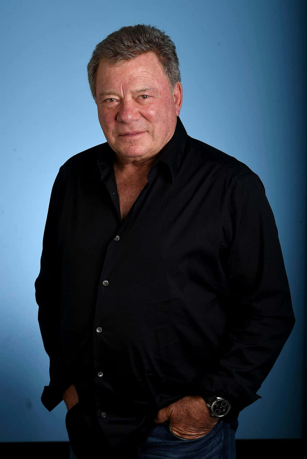 William Shatner, black shirt, solid blue studio backdrop, HD Phone Wallpaper