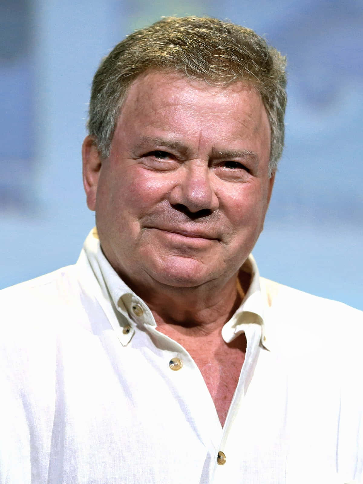 William Shatner, white button-down shirt, soft blue background, HD Phone Wallpaper