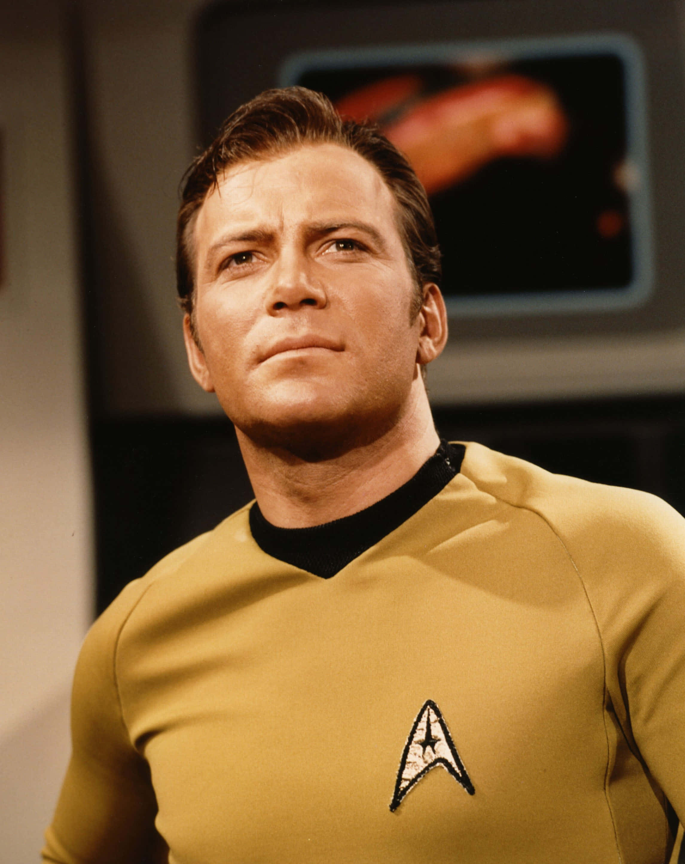 William Shatner, gold Starfleet uniform, spaceship set, 2K Phone Wallpaper
