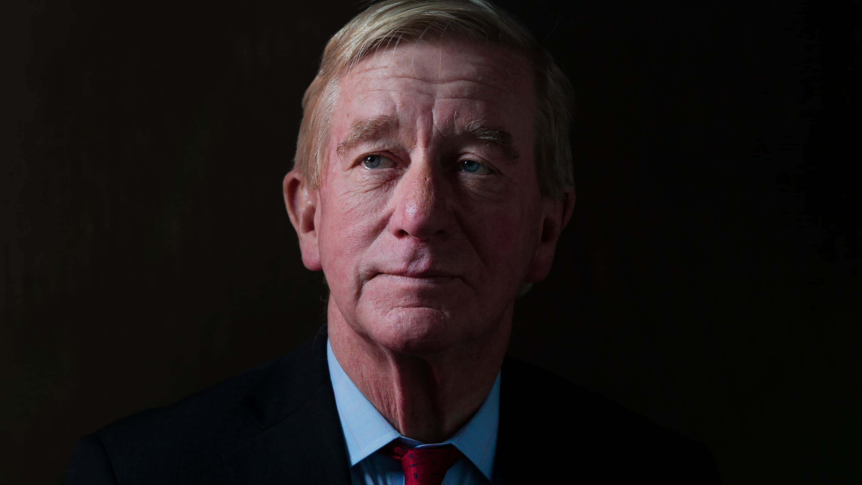 William Weld, dark suit, red tie, 2K Desktop Wallpaper