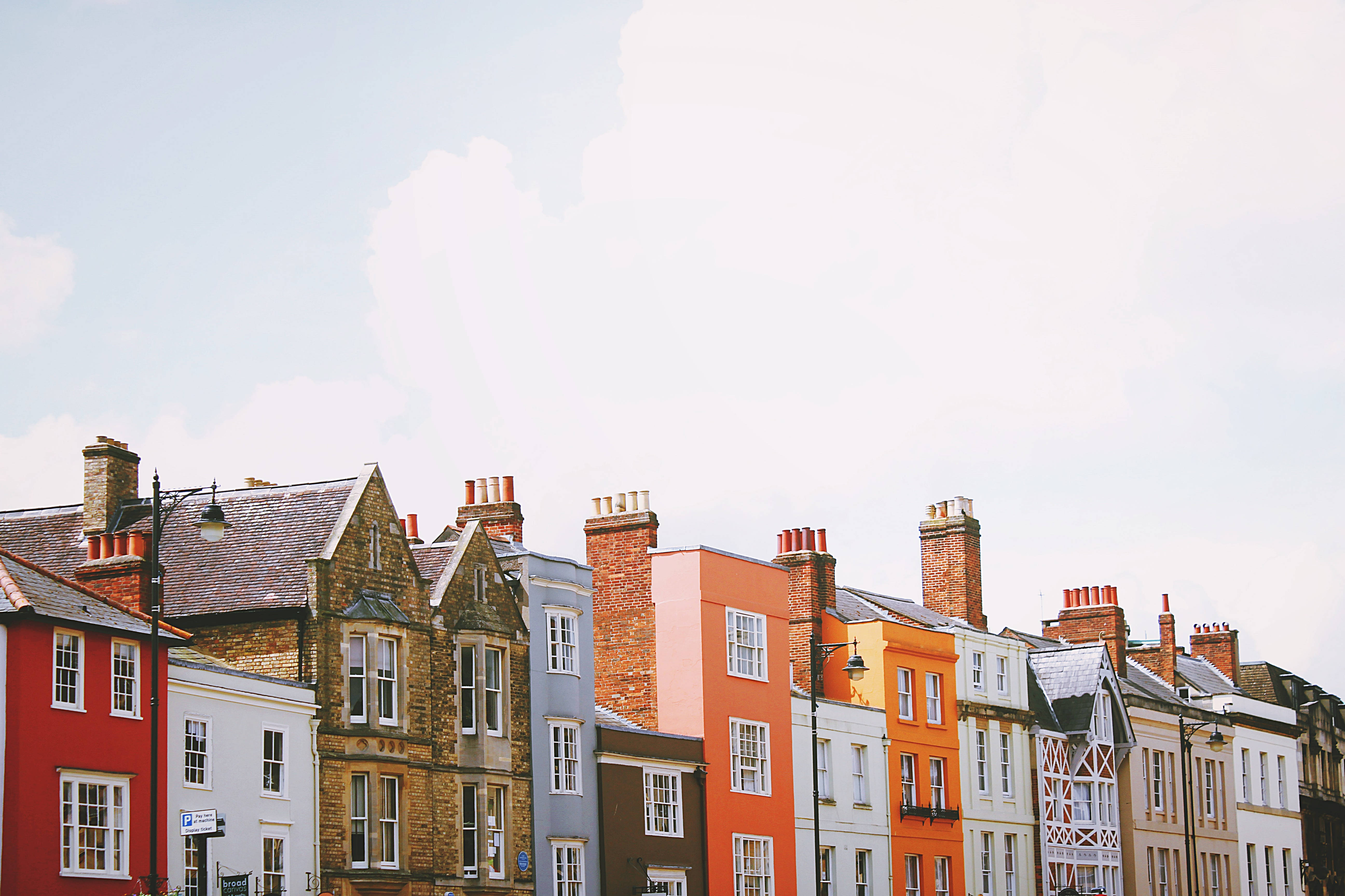 Windows 10 Live, red brick chimneys, soft blue sky, 5K Desktop Wallpaper