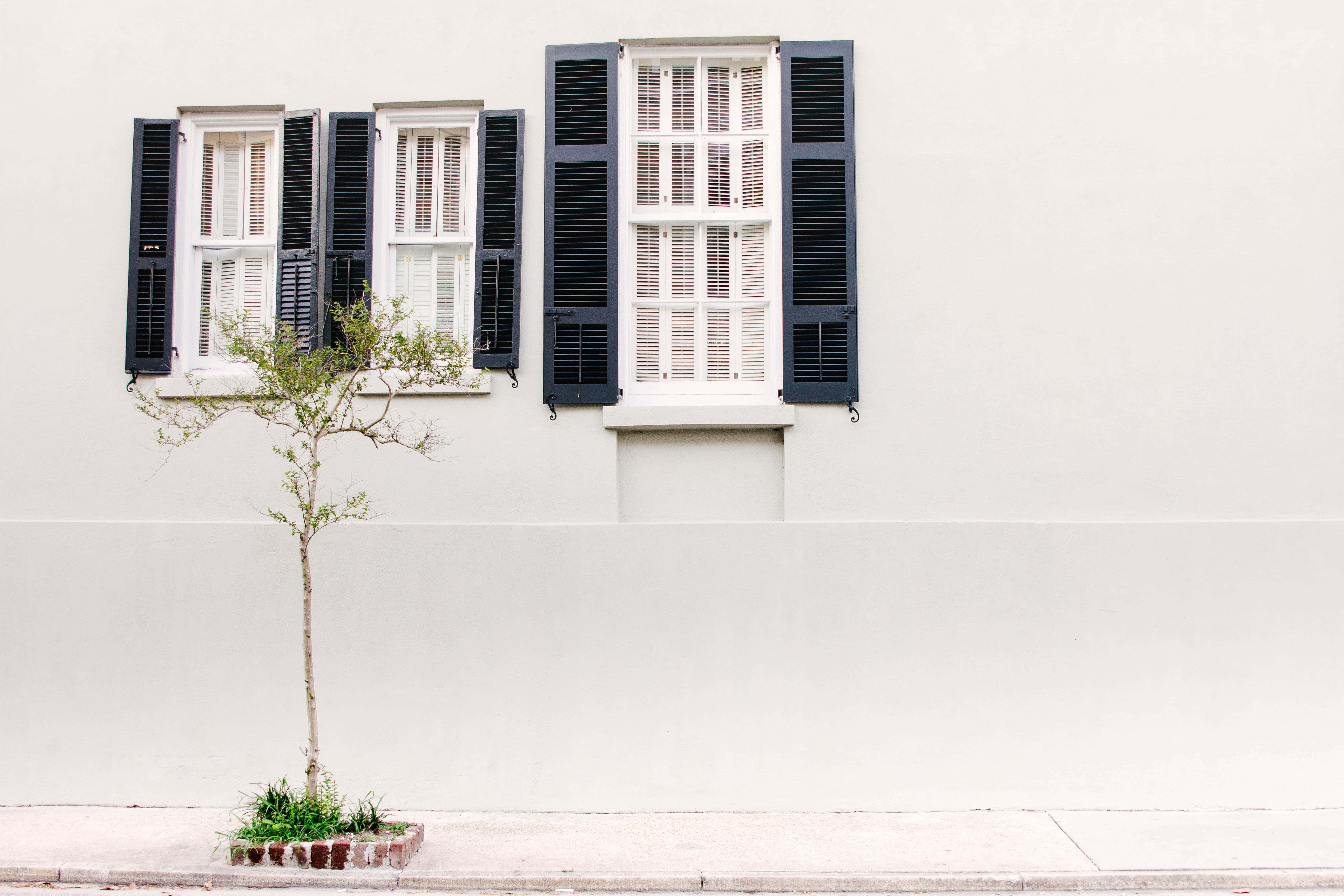 white wall, three windows, dark shutters, 4K Desktop Wallpaper