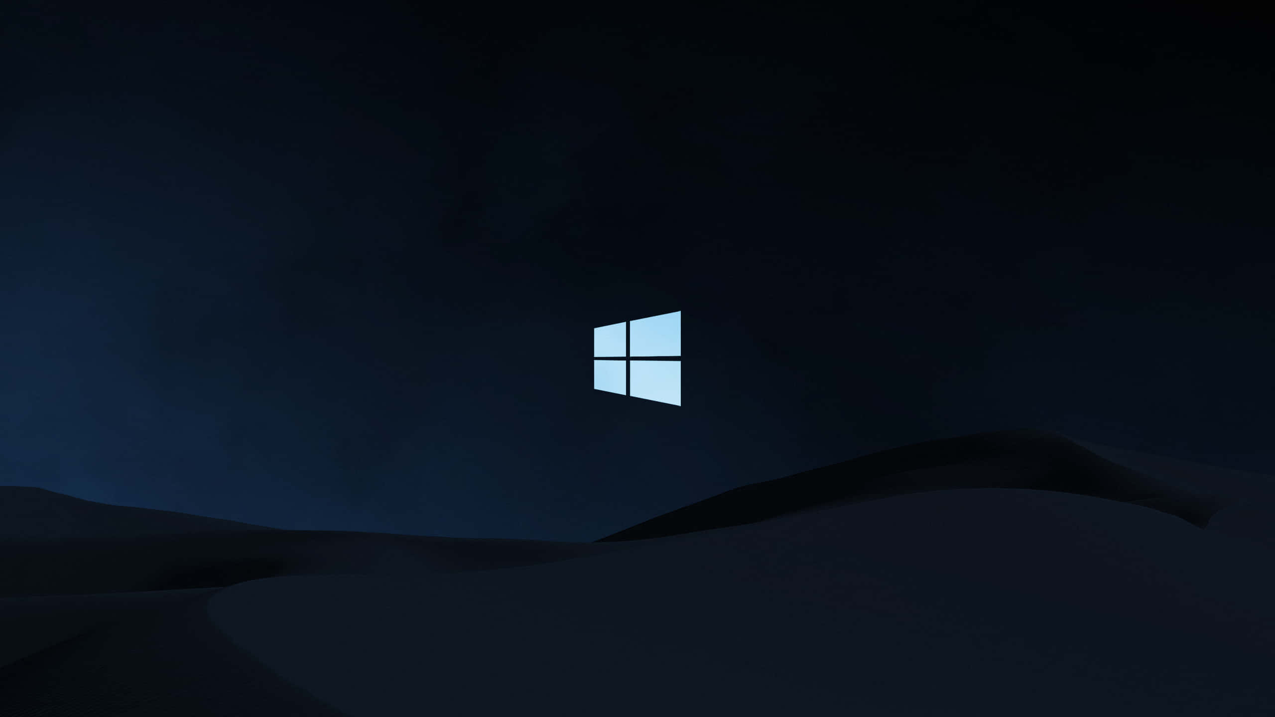 Windows, glowing blue Windows logo, dark rolling hills, 2K Desktop Wallpaper