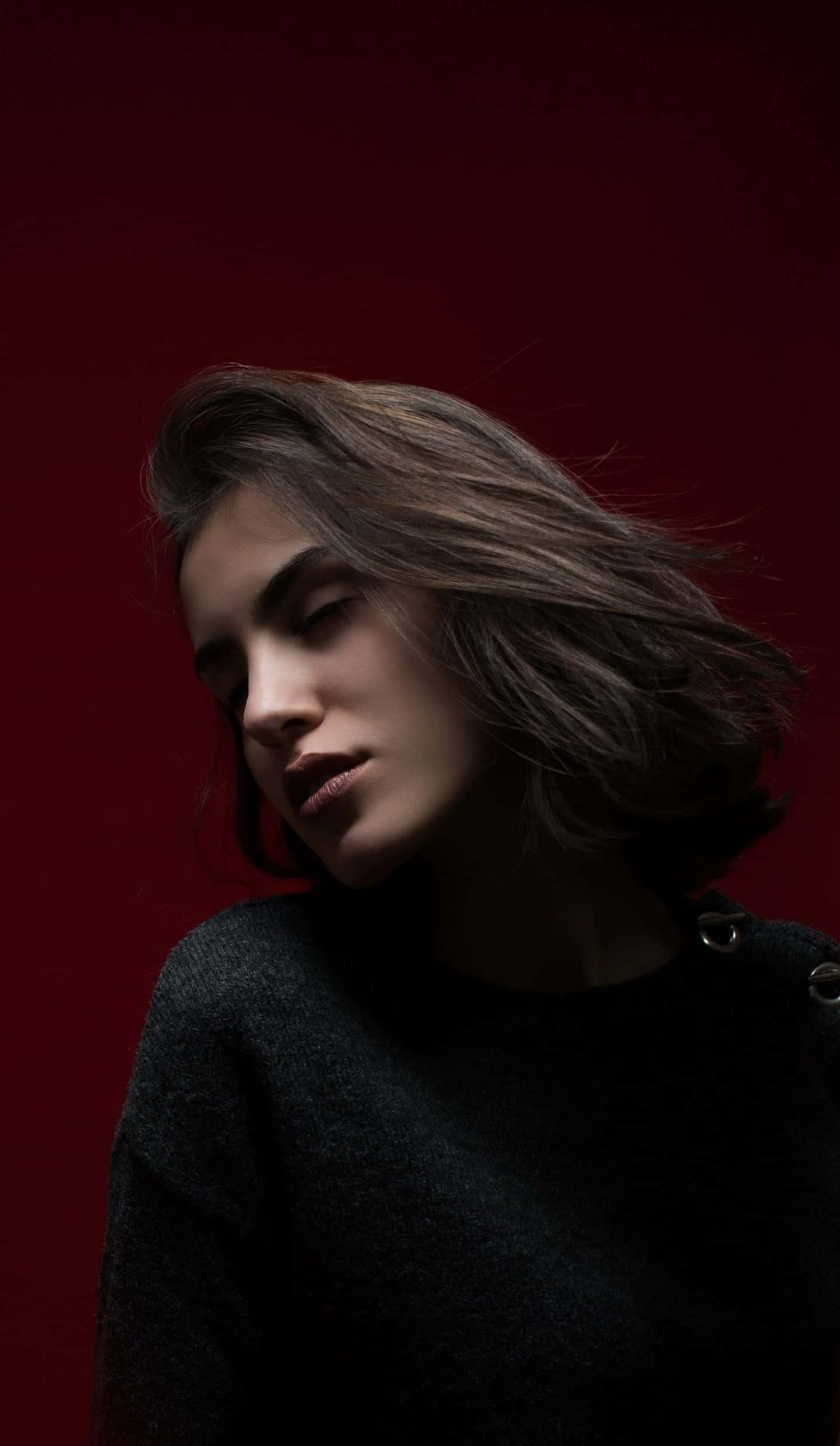 woman, windswept hair, deep red backdrop, Full HD Phone Wallpaper