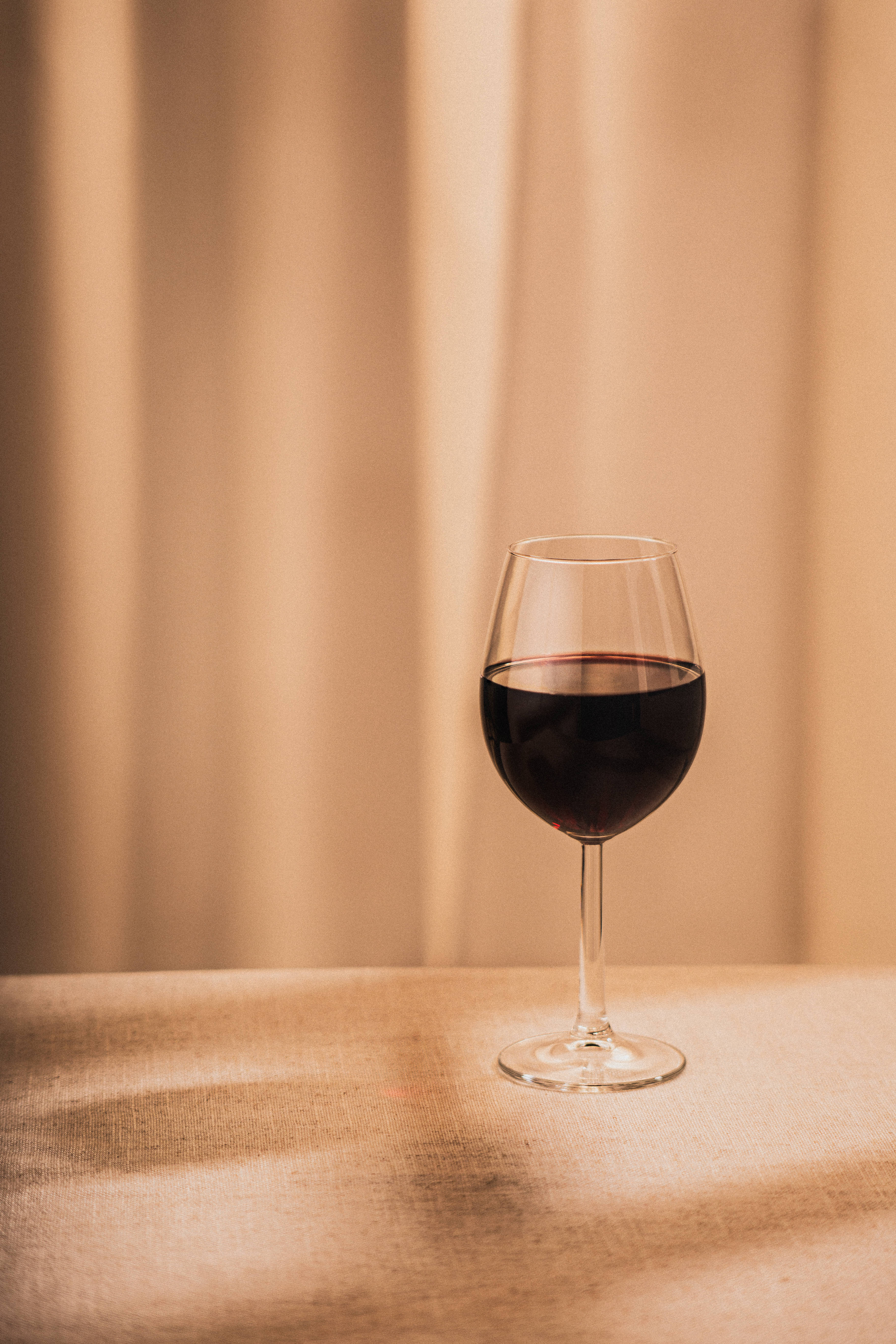 red wine, beige background, glass, 5K Phone Wallpaper