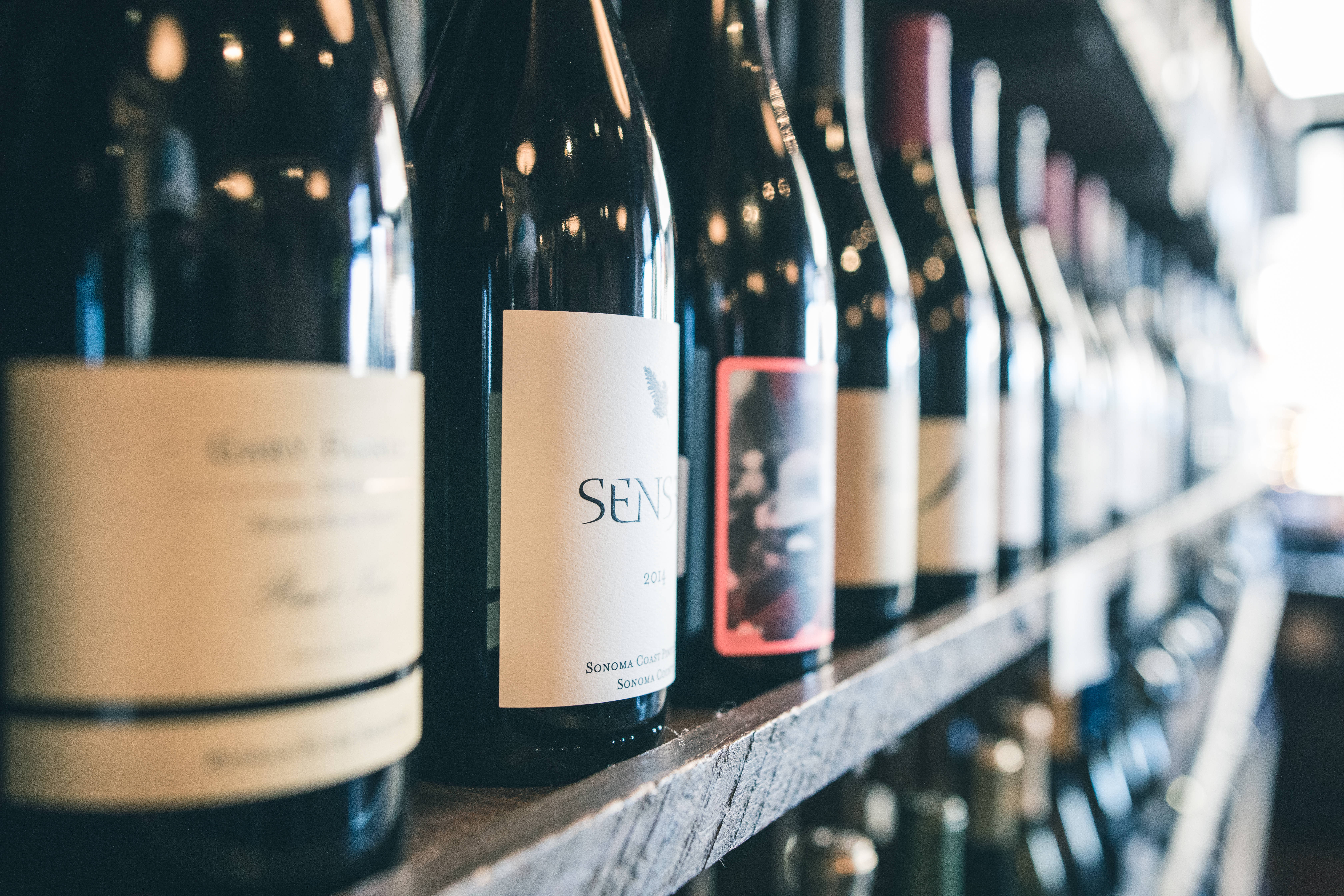 wine bottles, cream labels, red labels, 5K Desktop Wallpaper