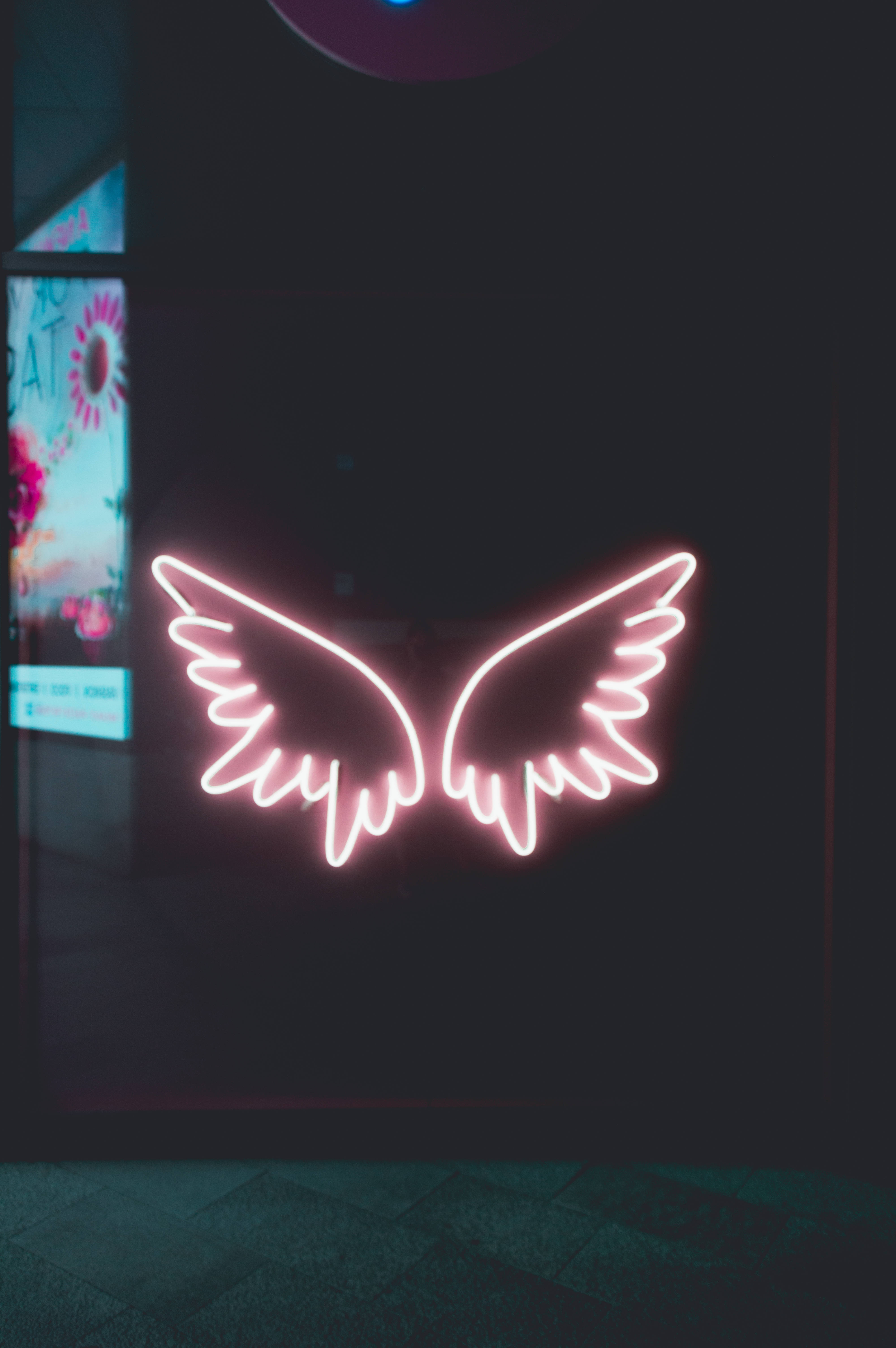 pink neon, angel wing sign, dark urban alleyway, 5K Phone Wallpaper