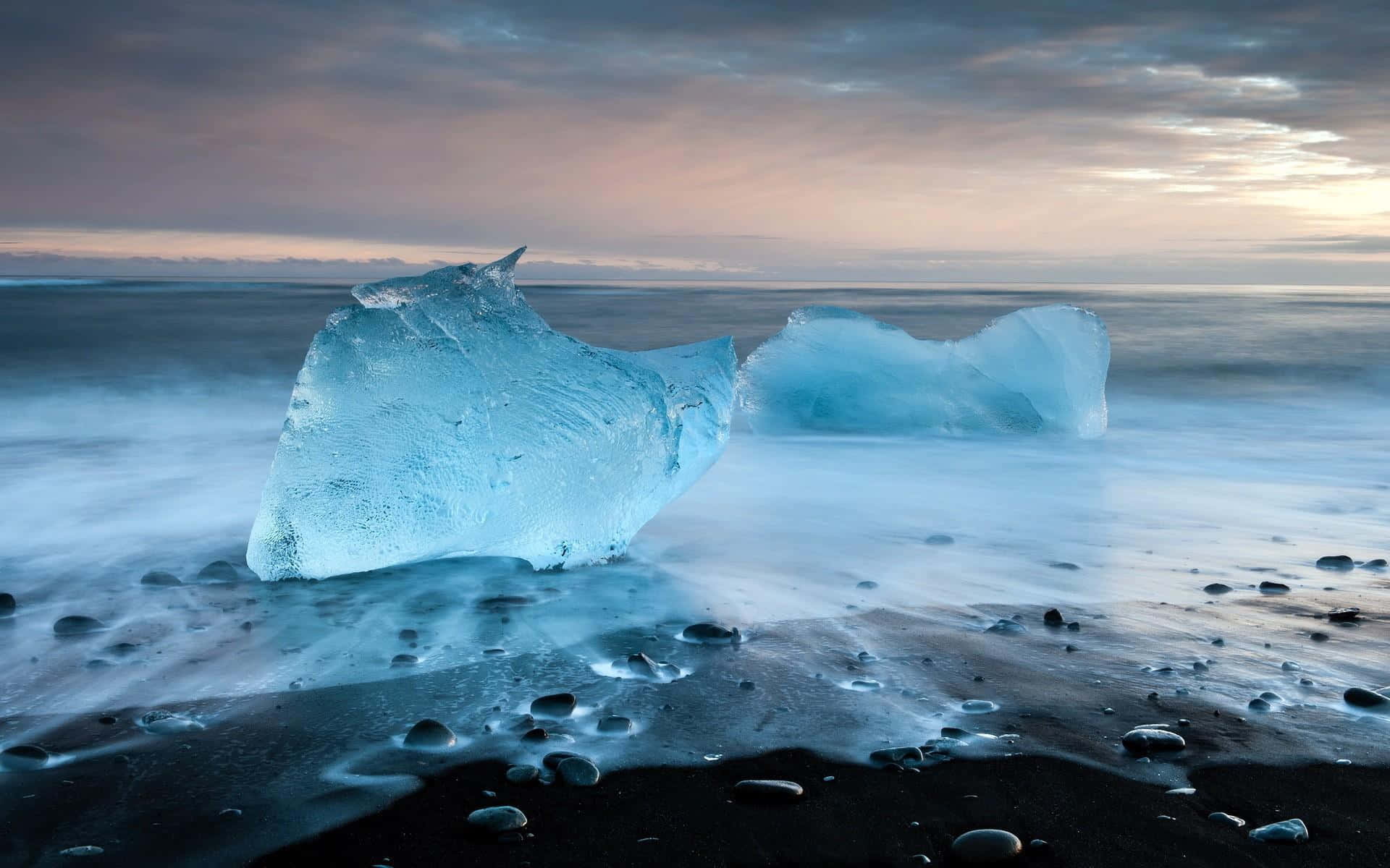 Winter Beach, glowing blue icebergs, black volcanic beach, Full HD Desktop Wallpaper