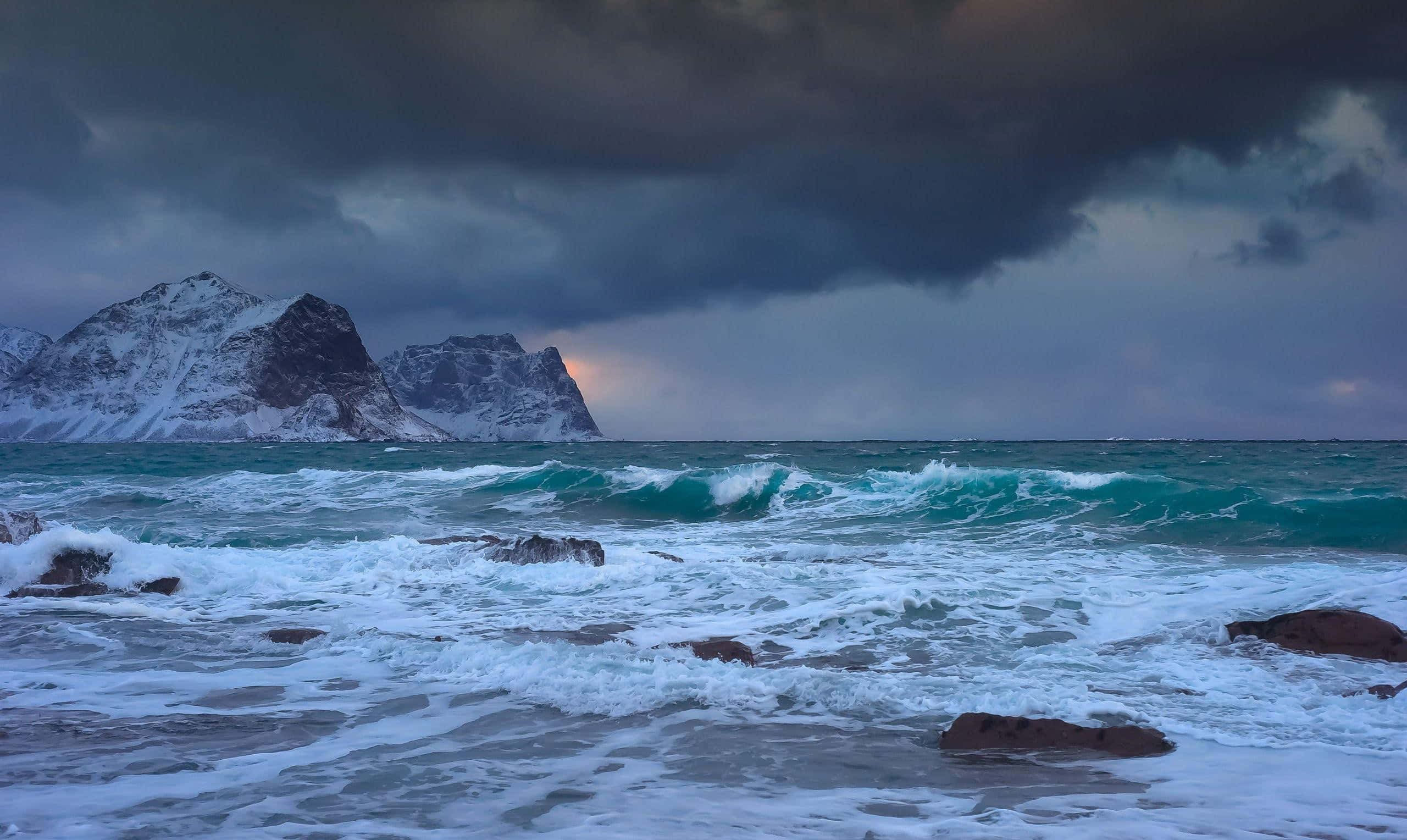 Winter Beach, turquoise waves, snowy rocks, 2K Desktop Wallpaper