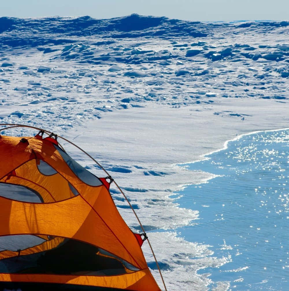 winter camping, bright orange tent, snowy ice, SD Phone Wallpaper
