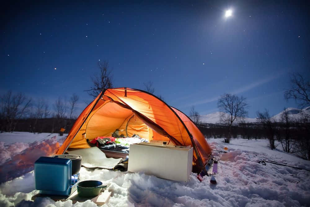 Winter Camping, glowing orange tent, snowy wilderness, SD Desktop Wallpaper