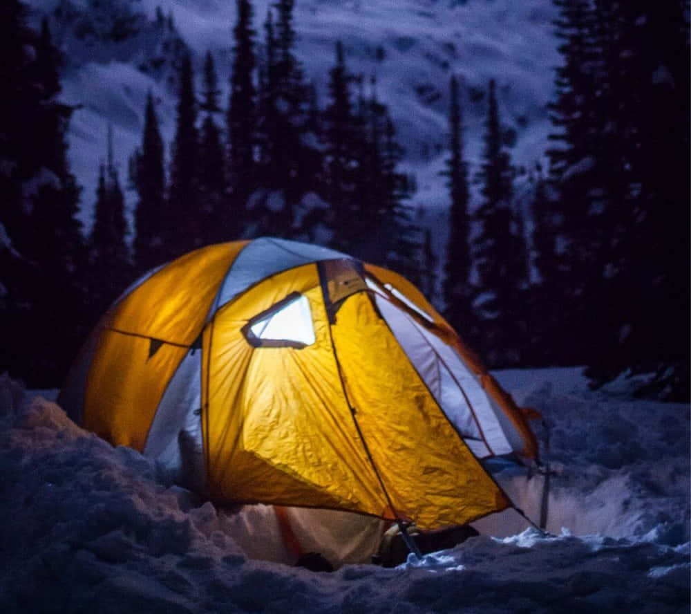 Winter Camping, glowing yellow tent, snowy woods, SD Desktop Wallpaper