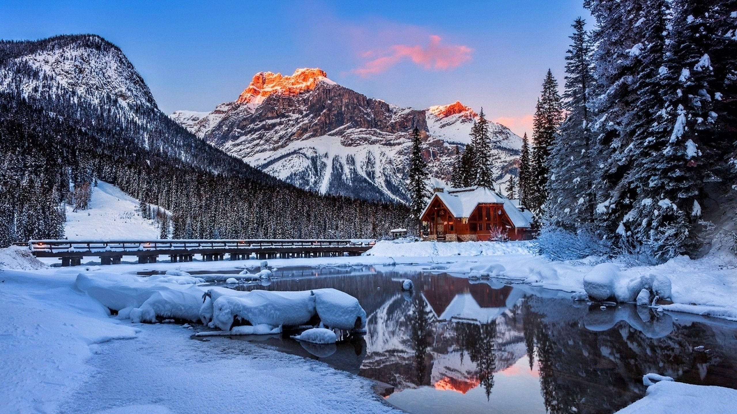lodge, snow-covered wooden cabin, calm river, 2K Desktop Wallpaper