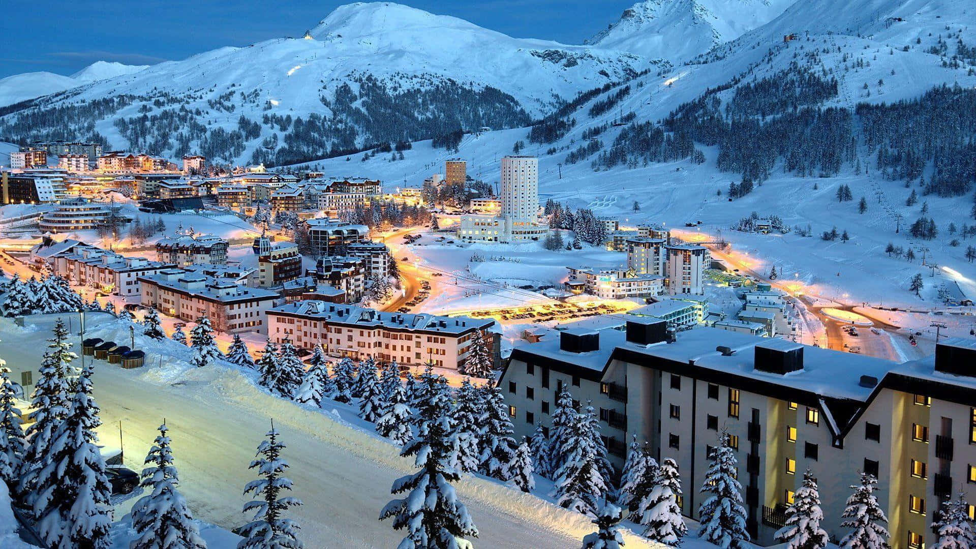 Winter Cityscape, snow-covered mountain village, illuminated buildings, Full HD Desktop Wallpaper