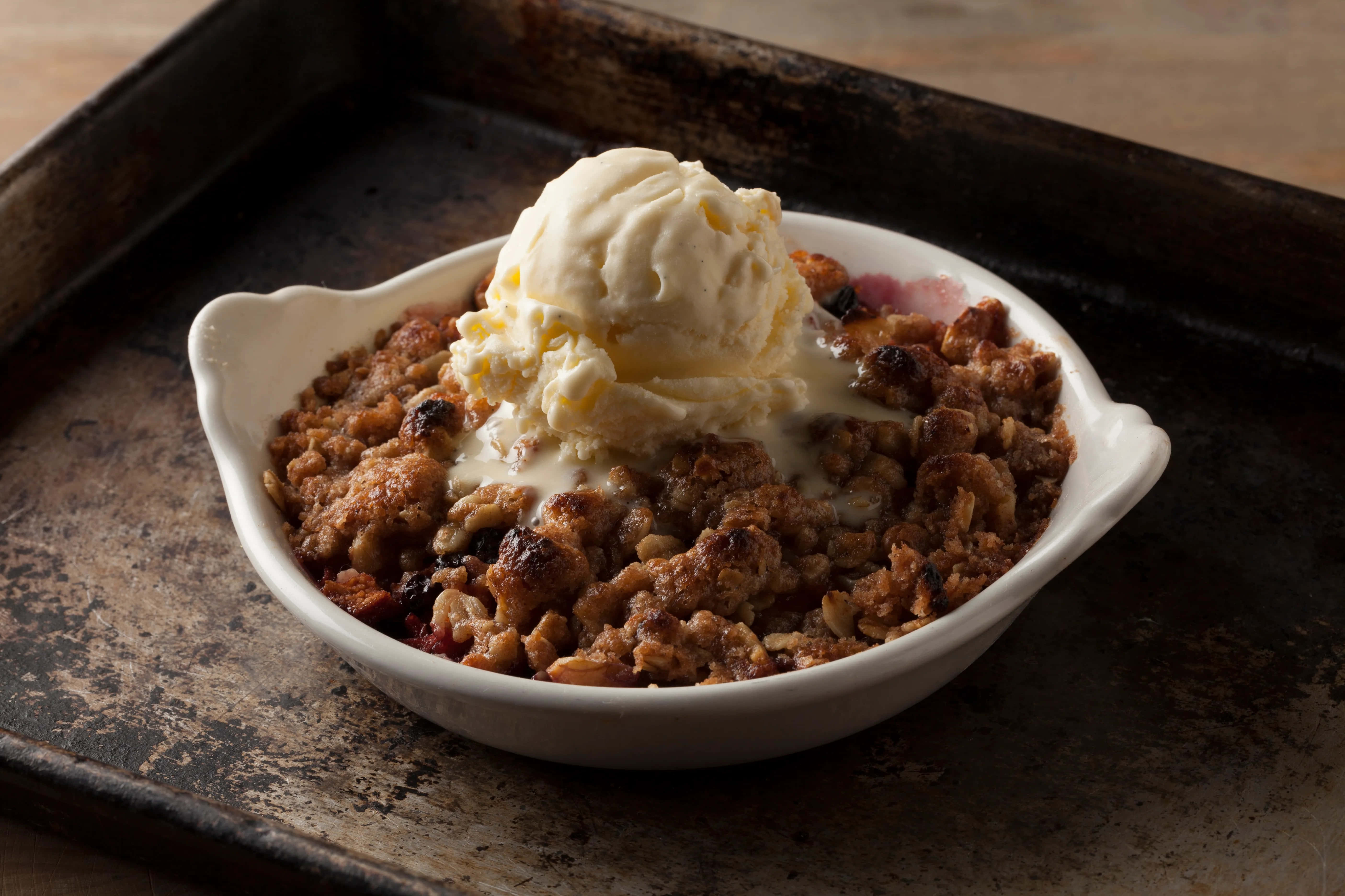 winter desserts, rustic wooden table, baked fruit crumble, 5K Desktop Wallpaper