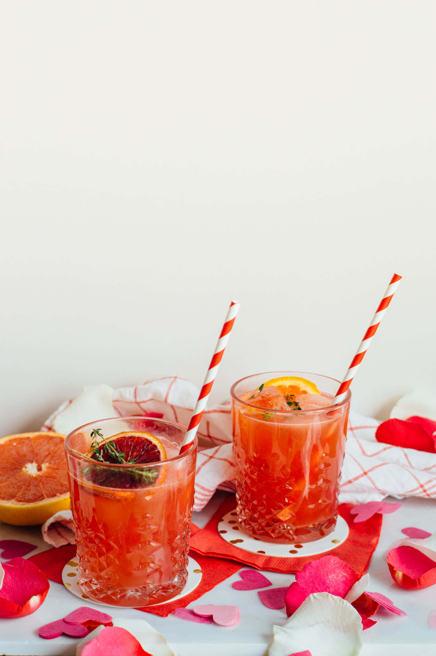 Winter Drinks, vibrant pink citrus drink, striped straws, 2K Phone Wallpaper