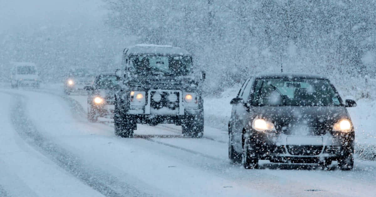 Winter Driving, snow-blanketed road, heavy snowfall, SD Desktop Wallpaper