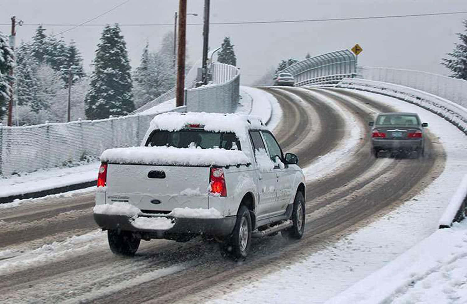 snow-covered white pickup truck, winding icy road, snow-laden evergreens, HD Desktop Wallpaper
