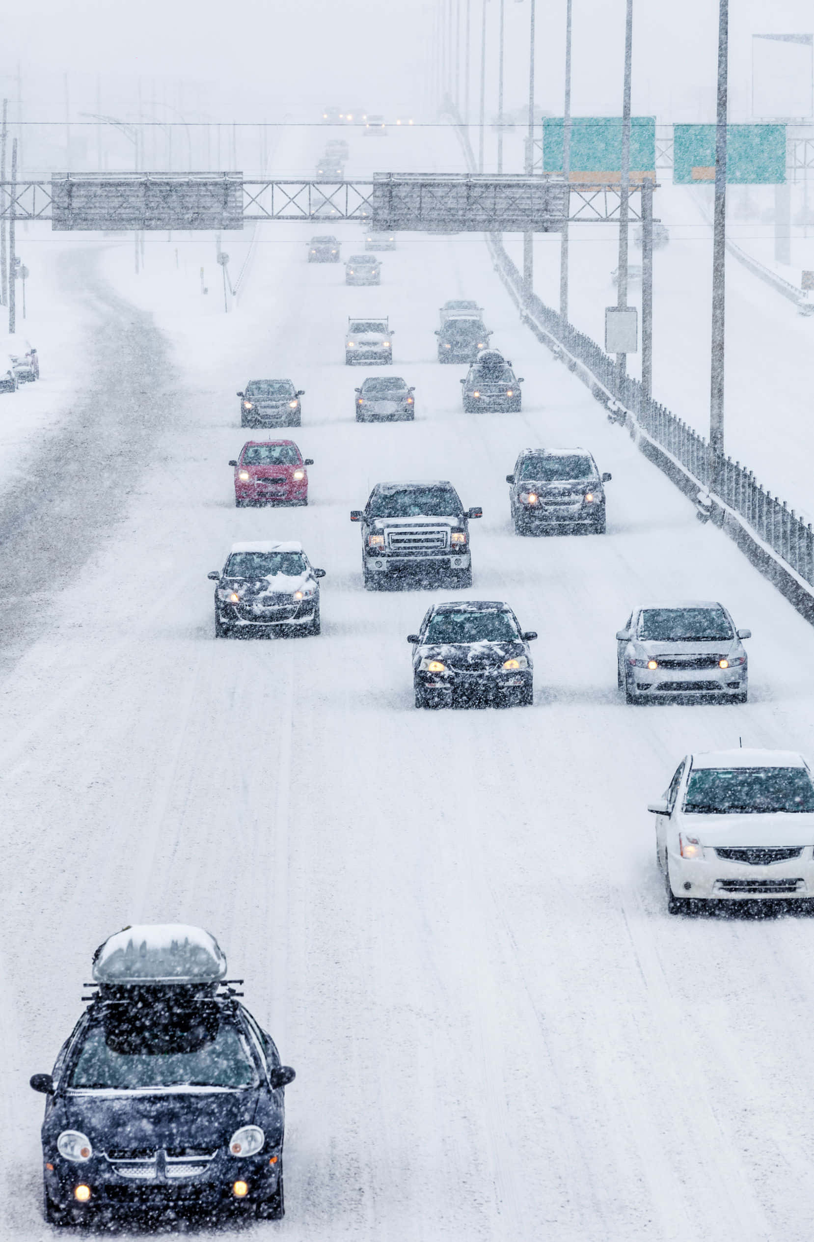 snow-covered highway, cars driving cautiously, heavy snowfall, Full HD Phone Wallpaper