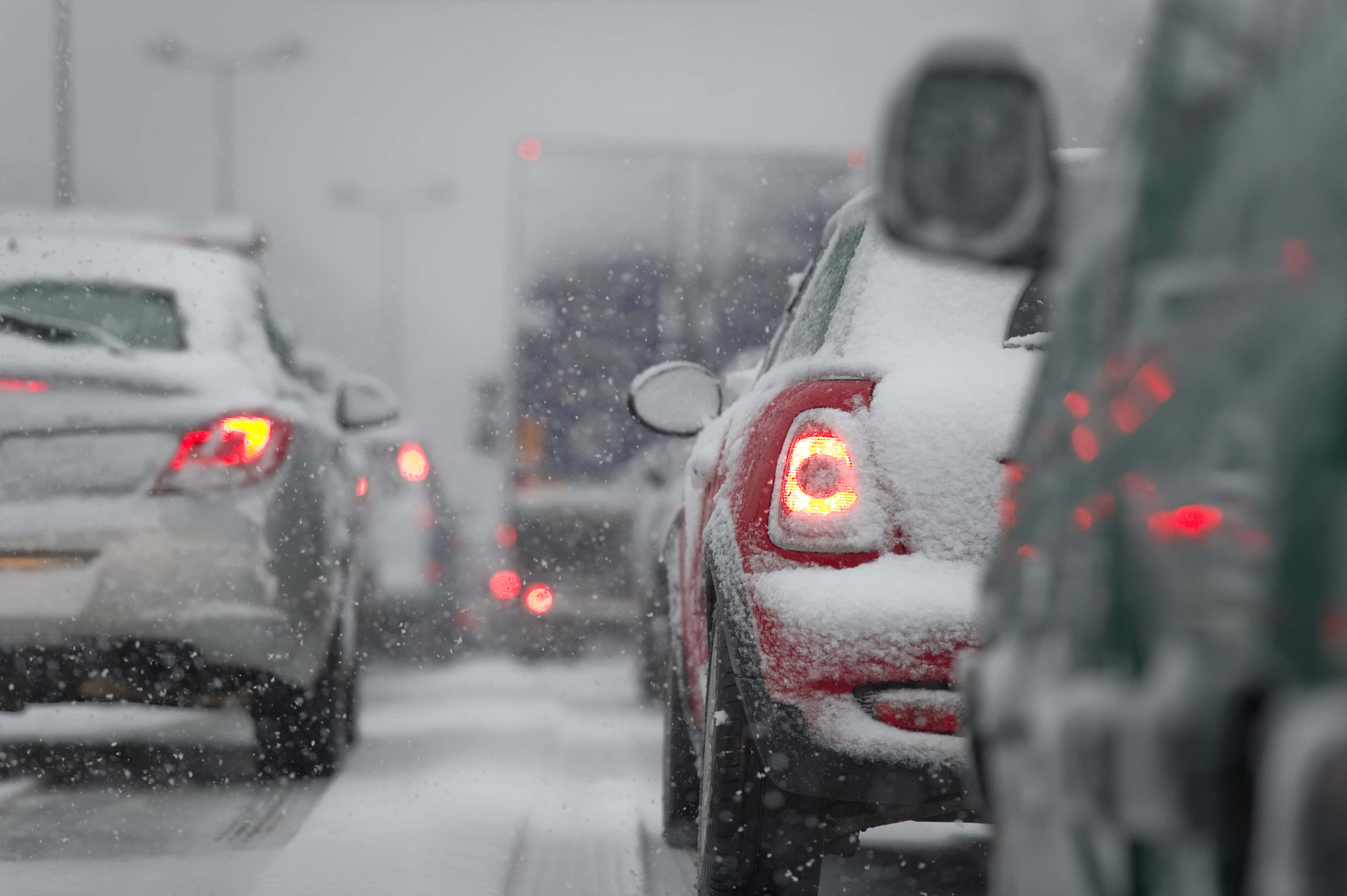 snowy mountain road, frozen traffic jam, red taillights, 4K Desktop Wallpaper