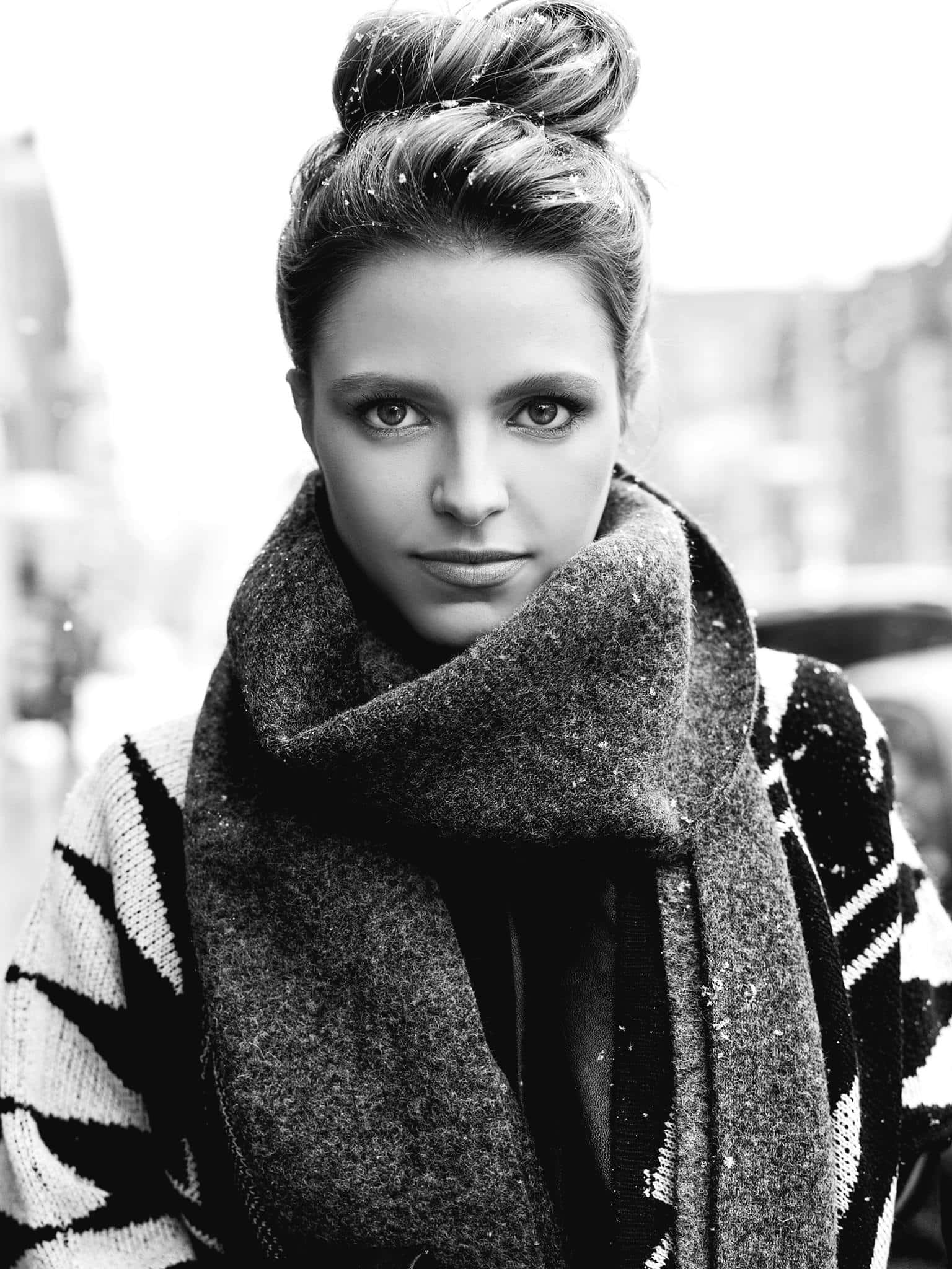 snow-dusted hair, thick scarf, snowy urban setting, Full HD Phone Wallpaper