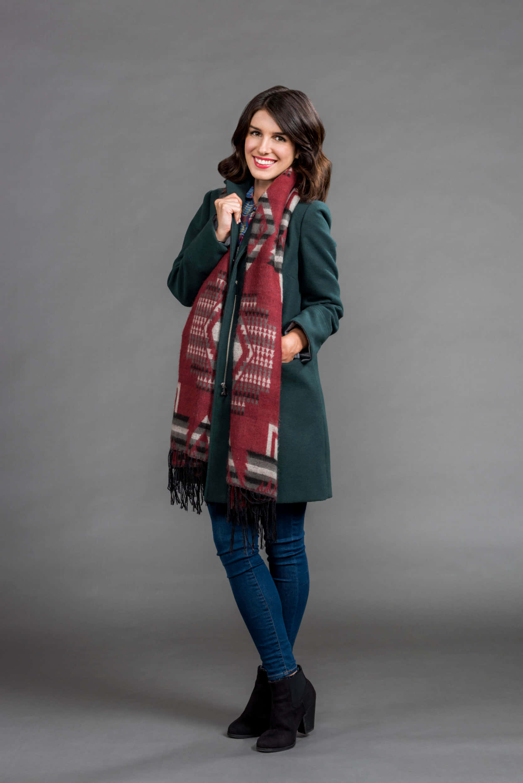 dark green coat, patterned red scarf, plain gray studio backdrop, Full HD Phone Wallpaper