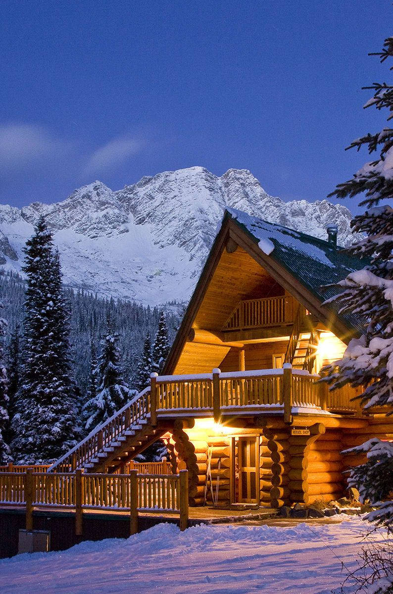 Winter House, snow-covered log cabin, snow-capped mountains, SD Phone Wallpaper
