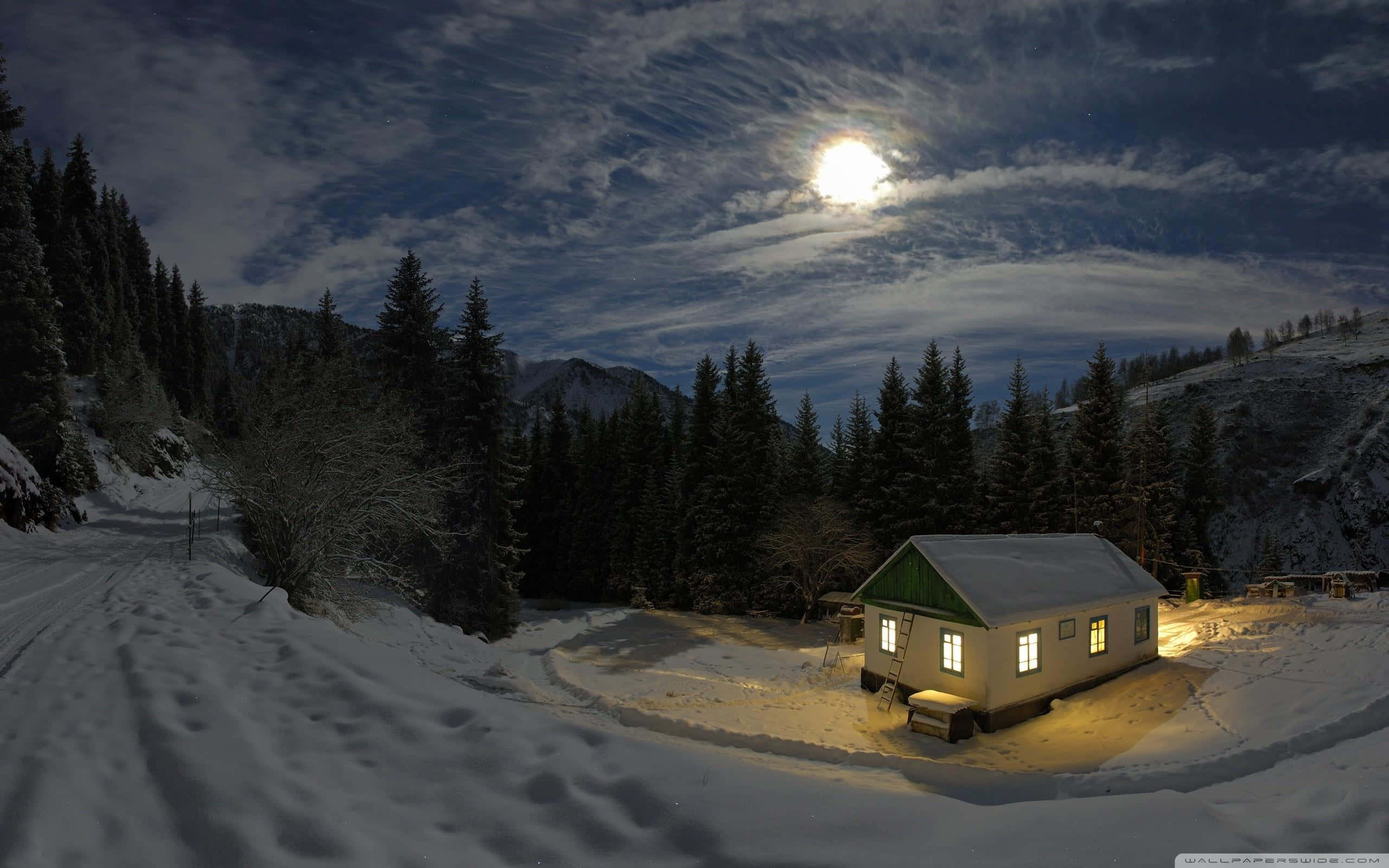 Winter Night Desktop, cozy cabin, bright moonlit sky, 2K Desktop Wallpaper