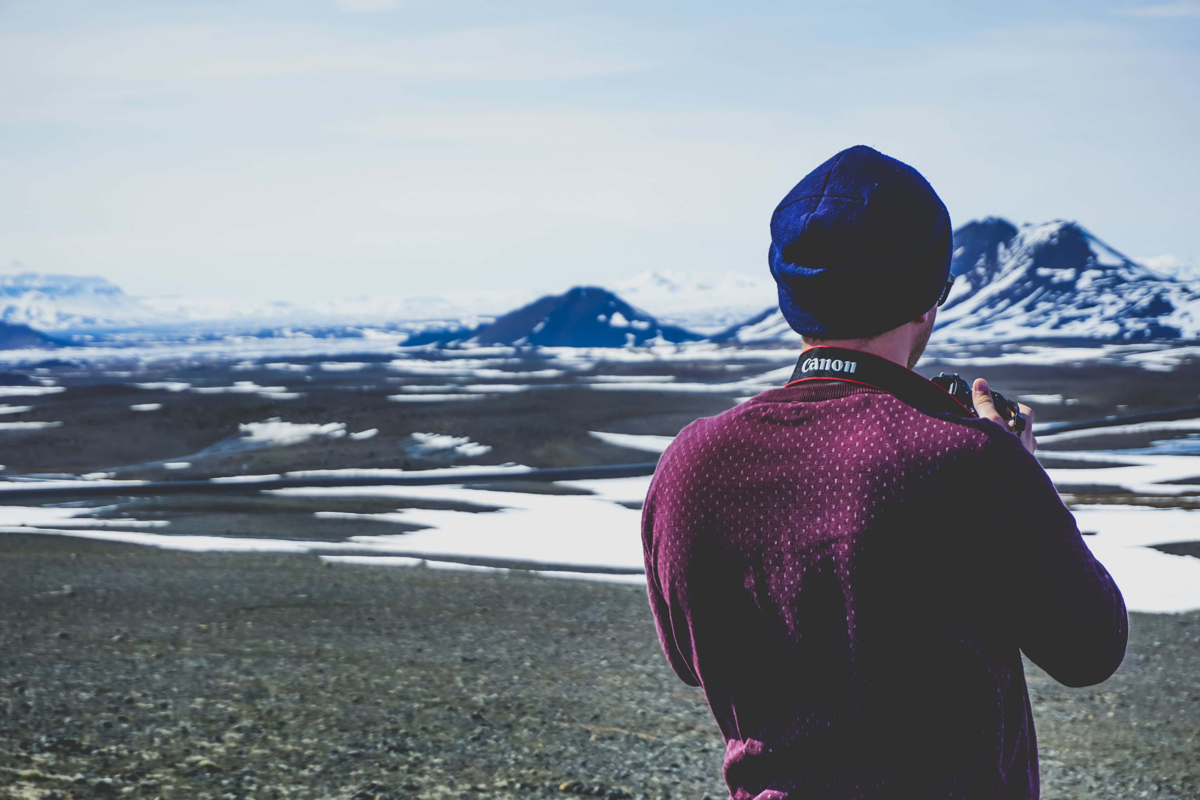 icy terrain, purple shirt, snow capped mountains, 4K Desktop Wallpaper