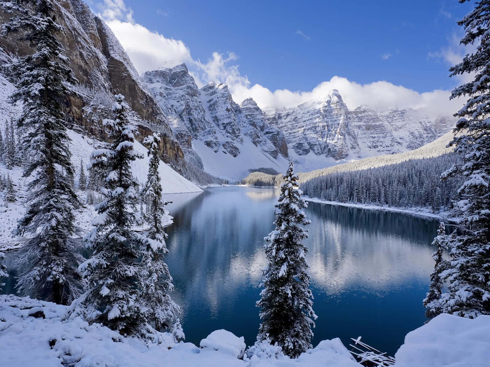 snow-covered mountain lake, bright blue sky, jagged peaks, HD Desktop Wallpaper